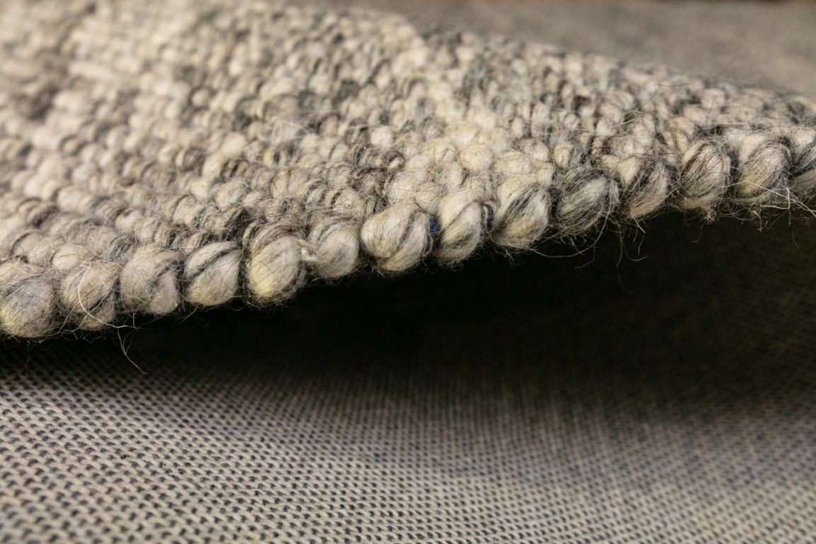 Park Lane Dark Grey is a contemporary hand woven flatweave rug. Made from 80%  New Zealand Wool and 20% polyester for a soft and slightly textured feel. Colour Dark Grey. Sizes 155 X 225, 200 X 290, 240 X 320 and 300 X 400. Side.