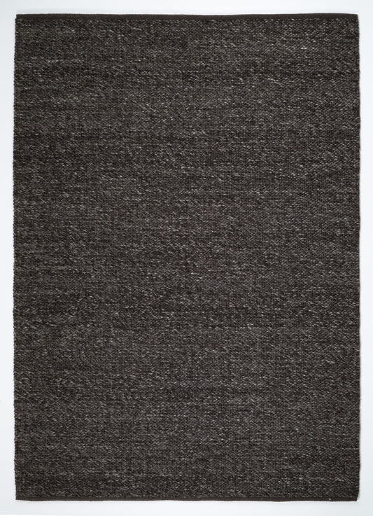 Park Lane Shadow is a contemporary hand woven flatweave rug. Made from 80%  New Zealand Wool and 20% polyester for a soft and slightly textured feel. Colour Blackish Grey. Sizes 155 X 225, 200 X 290, 240 X 320 and 300 X 400. Full.