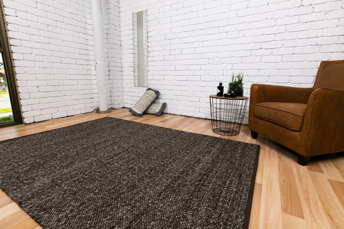 Park Lane Shadow is a contemporary hand woven flatweave rug. Made from 80%  New Zealand Wool and 20% polyester for a soft and slightly textured feel. Colour Blackish Grey. Sizes 155 X 225, 200 X 290, 240 X 320 and 300 X 400. Life.