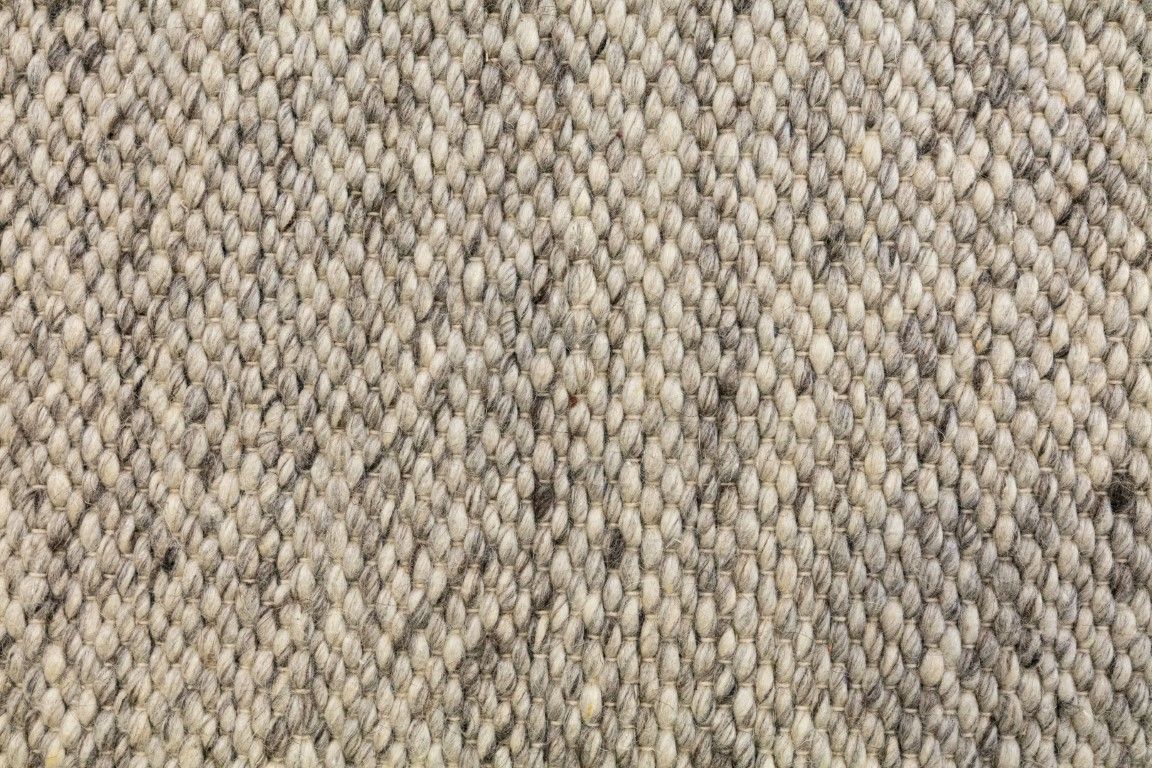 Park Lane Smoke is a contemporary hand woven flatweave rug. Made from 80%  New Zealand Wool and 20% polyester for a soft and slightly textured feel. Colour Smokey Grey. Sizes 155 X 225, 200 X 290, 240 X 320 and 300 X 400. Close.
