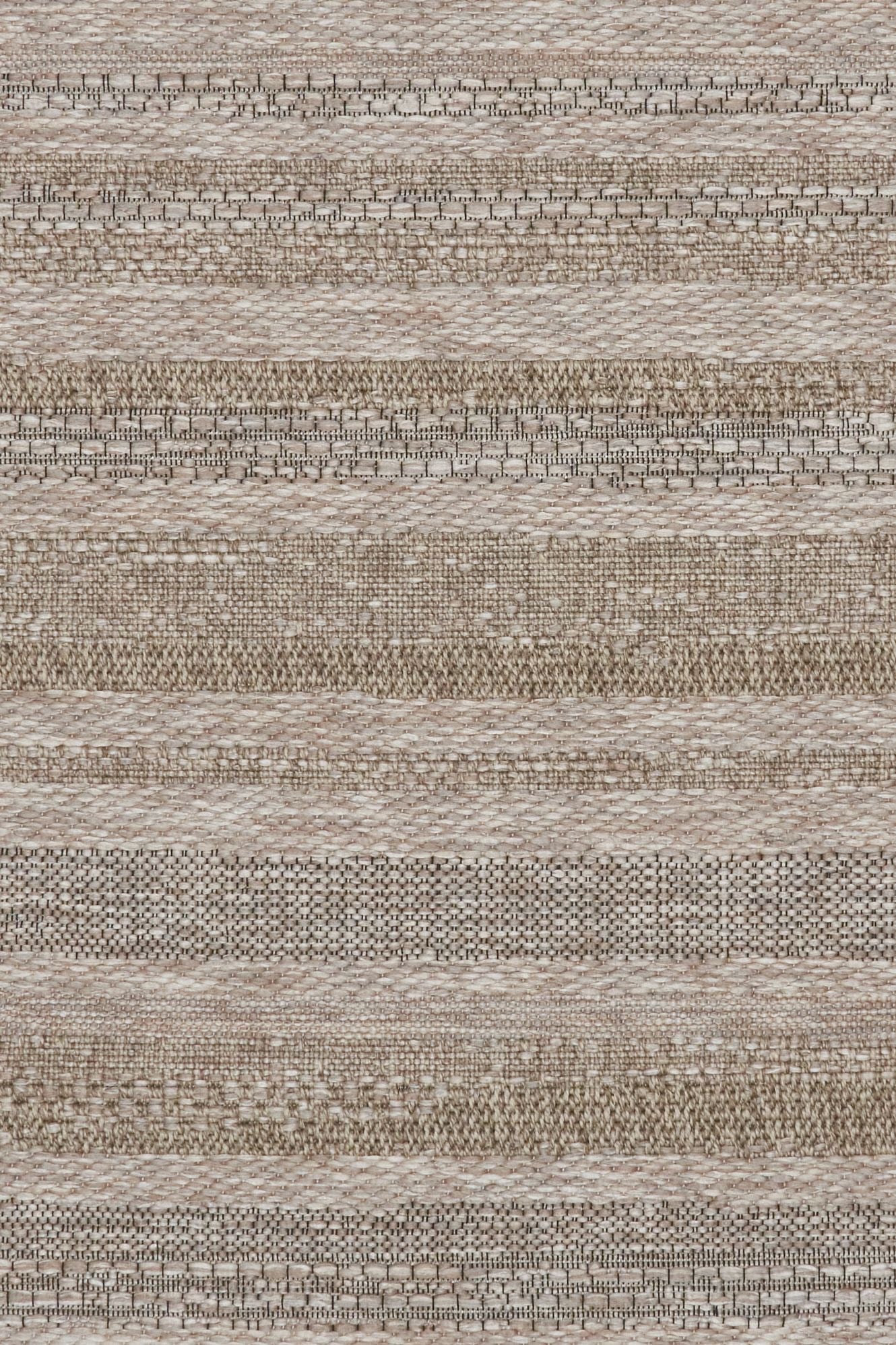 The Patio Linear Straw indoor/outdoor rug featuring neutral tones and a subtle textured pattern, power-loomed from UV-stabilised polypropylene for lasting durability. Colour Browns, Beiges and hints of black. 3 sizes. Close.