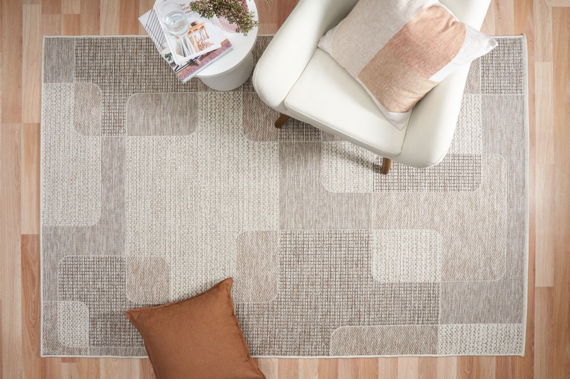 The Patio Linen 50005 indoor/outdoor rug featuring neutral tones and a modern designed pattern, power-loomed from UV-stabilised polypropylene for lasting durability. Colours, Linen, Beiges and hints of light grey. 3 sizes. Life.