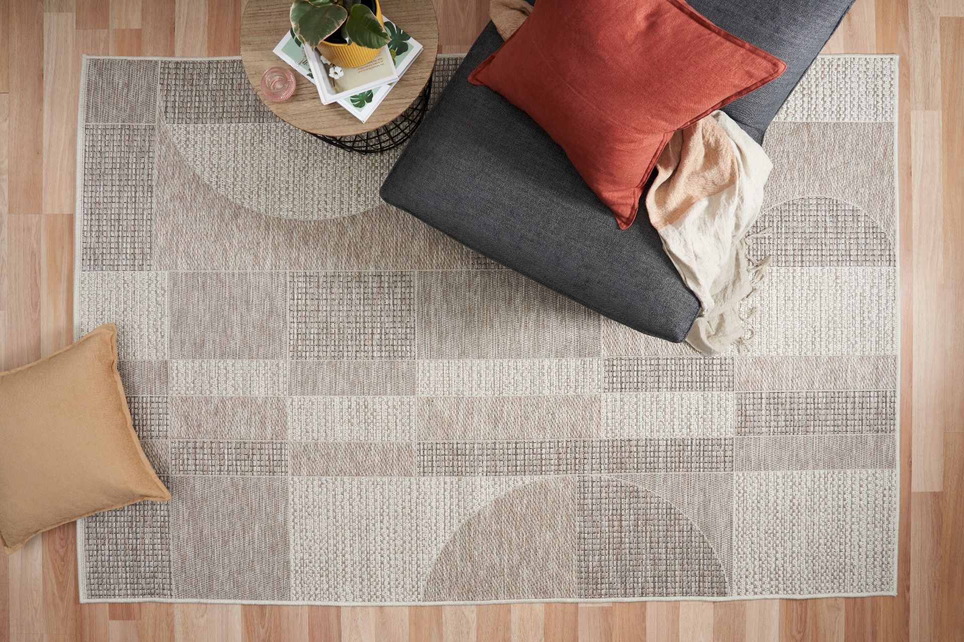 The Patio Linen 606 indoor/outdoor rug featuring neutral tones and a modern designed pattern, power-loomed from UV-stabilised polypropylene for lasting durability. Colours, Linen, Beiges and hints of light grey. 3 sizes. Life.