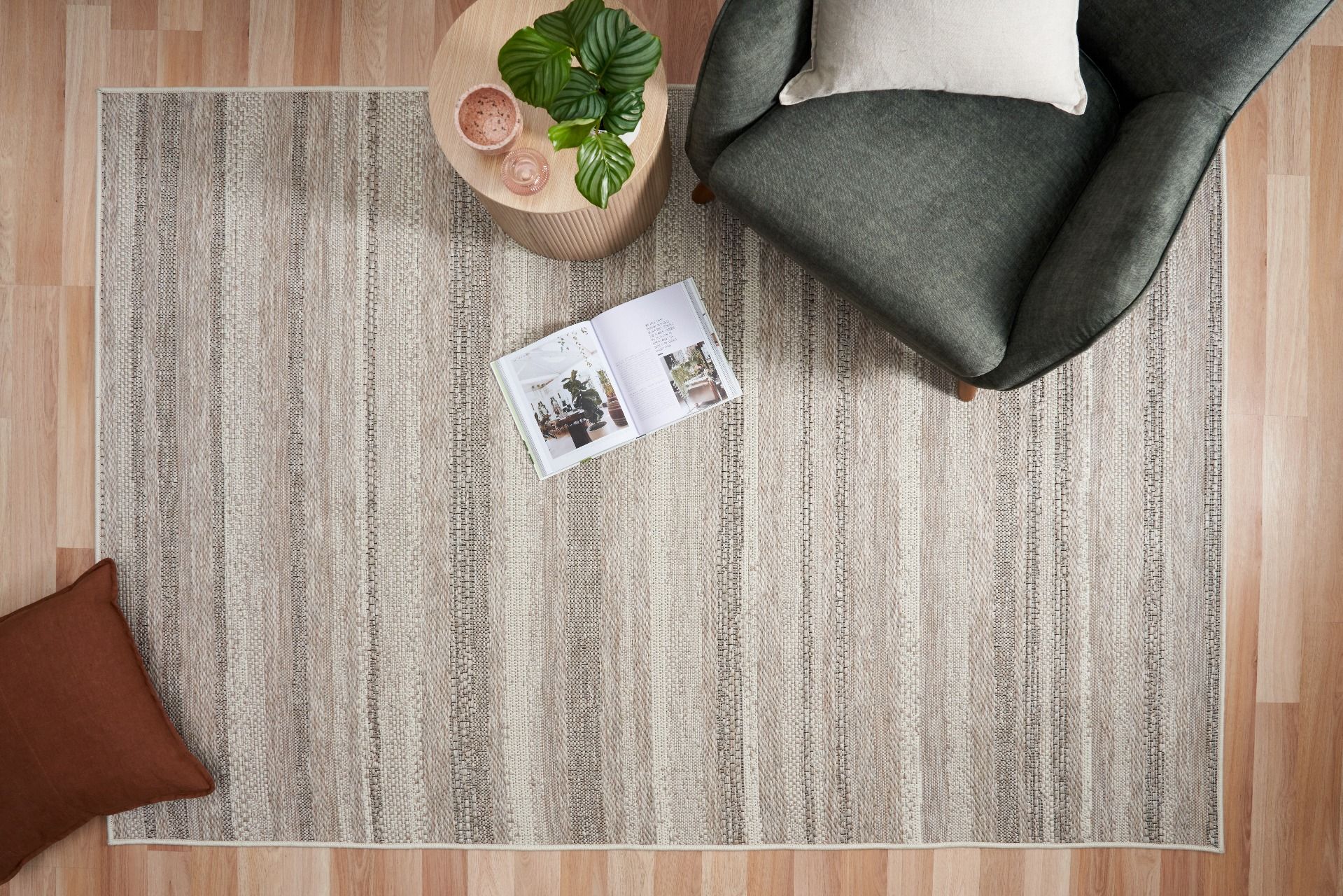 The Patio Linen 900 indoor/outdoor rug featuring neutral tones and a subtle textured pattern, power-loomed from UV-stabilised polypropylene for lasting durability. Colours, Linen, Beiges and hints of black. 3 sizes. Life.