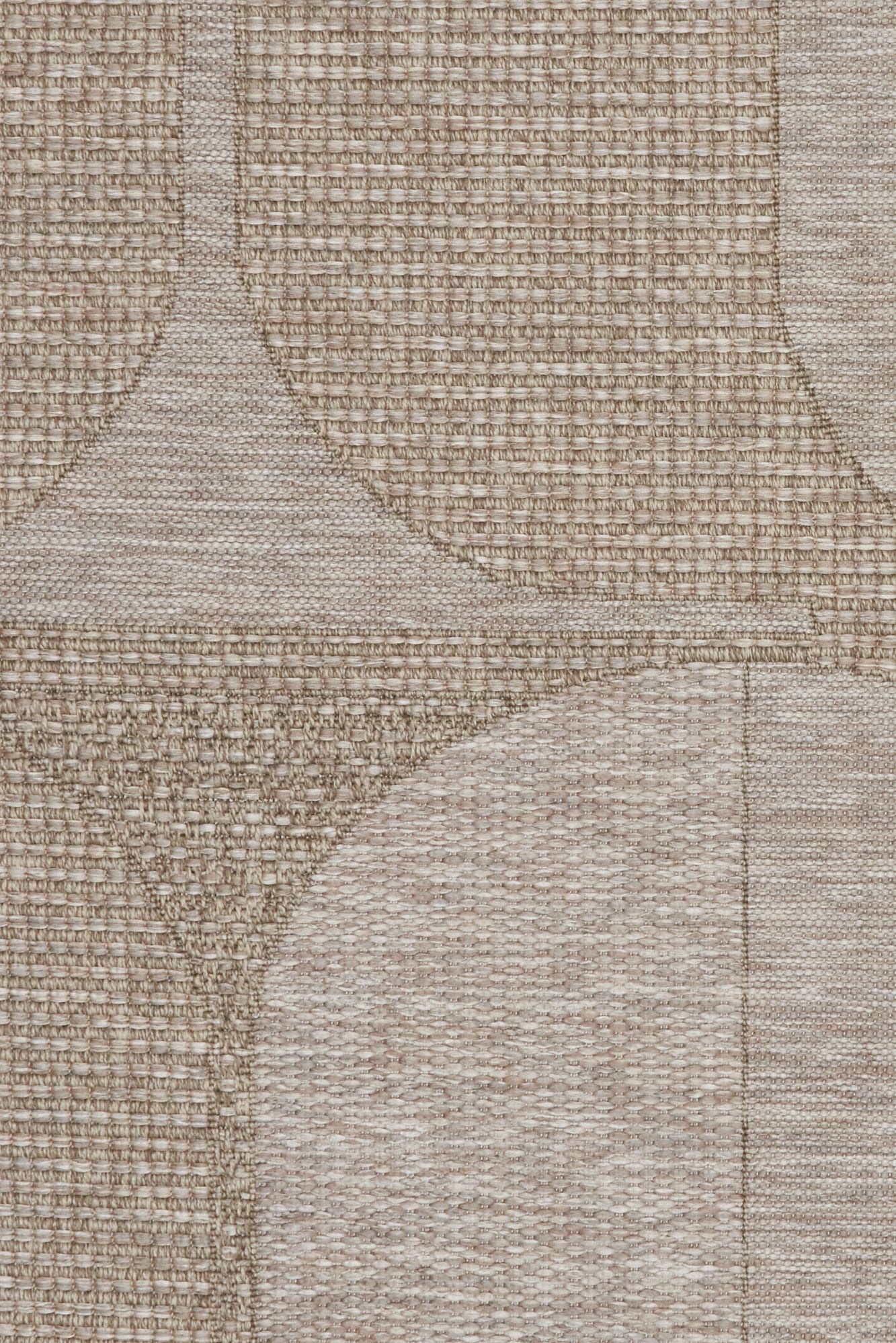 The Patio Ovals Straw indoor/outdoor rug featuring neutral tones and a modern designed pattern, power-loomed from UV-stabilised polypropylene for lasting durability. Colours, Linen, Beiges and hints of light grey. 3 sizes. Close.