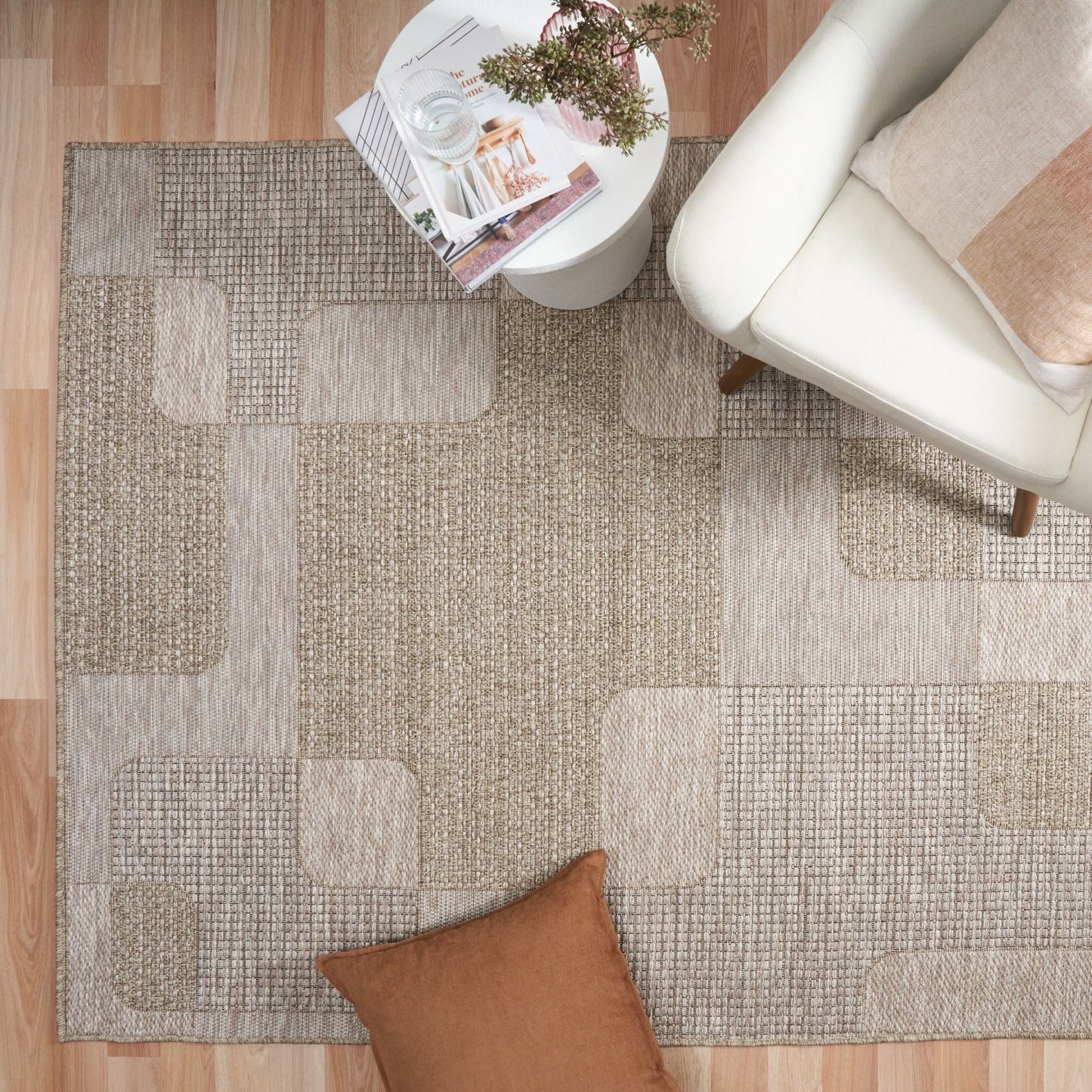 The Patio Squares Straw indoor/outdoor rug featuring neutral tones and a modern designed pattern, power-loomed from UV-stabilised polypropylene for lasting durability. Colours, Linen, Beiges and hints of light grey. 3 sizes. Life.