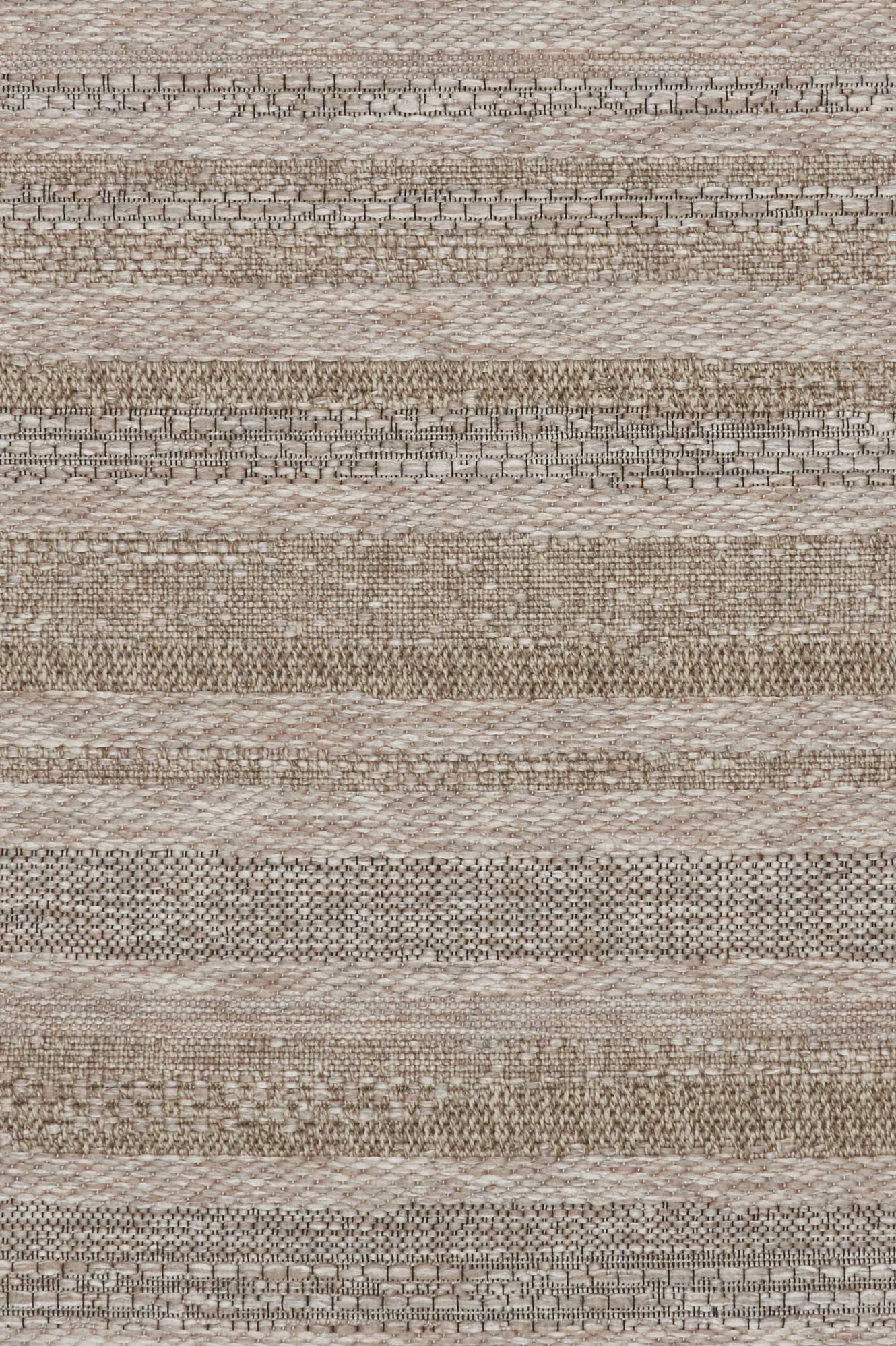 The Patio Straw 900 indoor/outdoor rug featuring neutral tones and a subtle textured pattern, power-loomed from UV-stabilised polypropylene for lasting durability. Colour Browns, Beiges and hints of black. 3 sizes. Close.