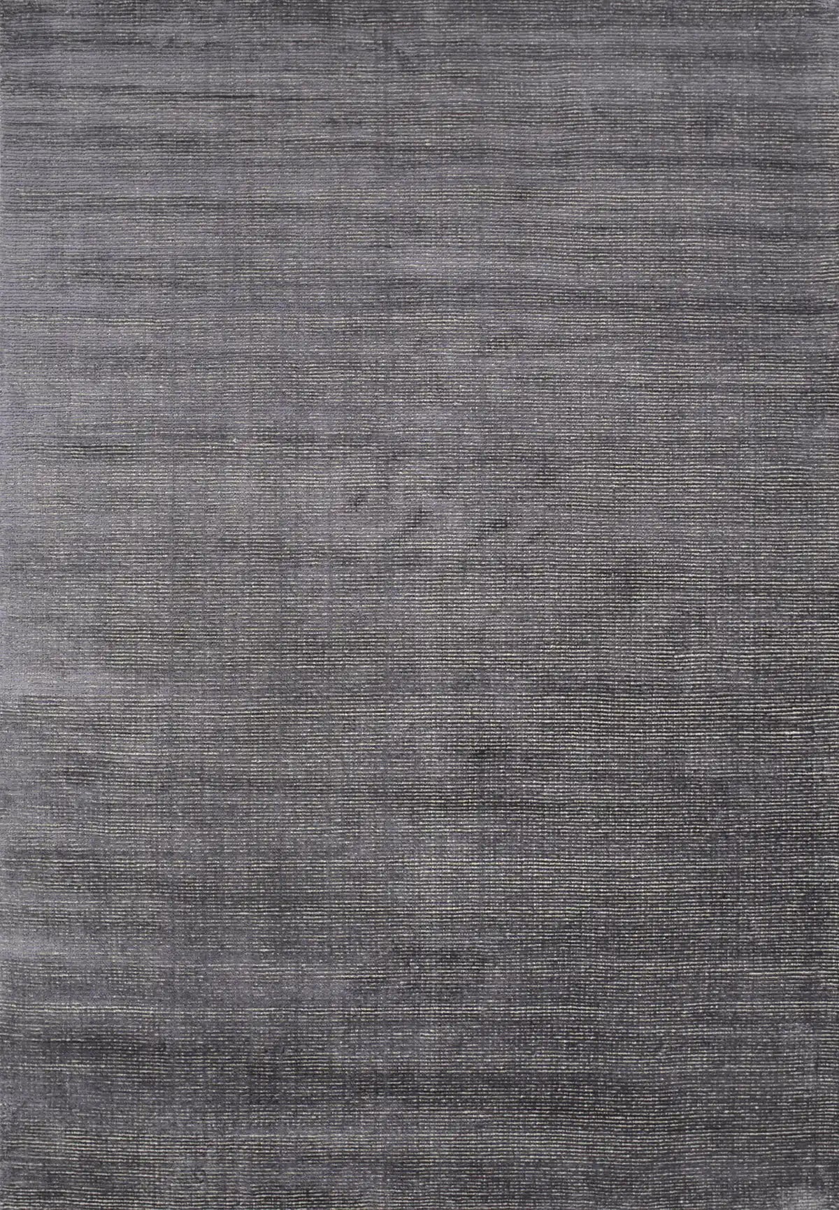 Pearl Garnet is a luxurious hand-loomed knotted rug made with wool and silky viscose. It boasts a ribbed texture and pile height of 12-14mm. Colour Blueish Grey with Beige accents. Sizes 160 X 230, 200 X 290 and 240 X 340. Full.