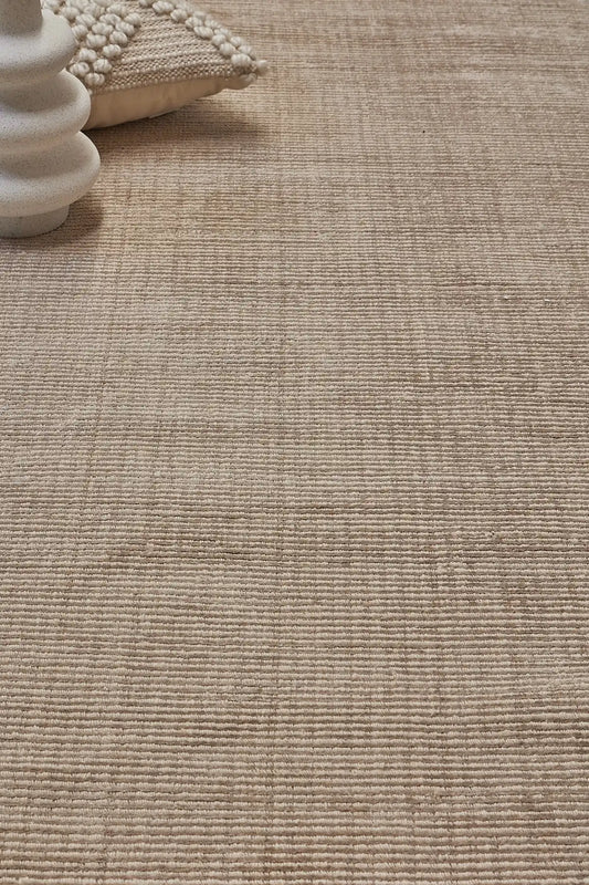 Pearl Olive is a luxurious hand-loomed knotted rug made with wool and silky viscose. It boasts a ribbed texture and pile height of 12-14mm. Colour light olive green. Sizes 160 X 230, 200 X 290 and 240 X 340. Life.