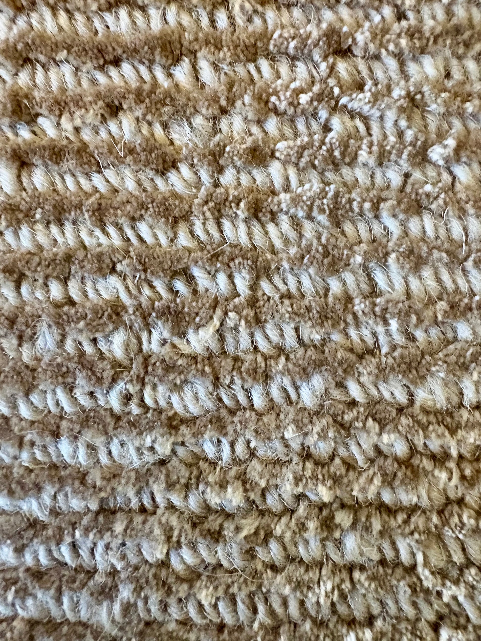 Pearl Coral is a luxurious hand-loomed knotted rug made with wool and silky viscose. It boasts a ribbed texture and pile height of 12-14mm. Colour Light Beige. Sizes 160 X 230, 200 X 290 and 240 X 340. Close.