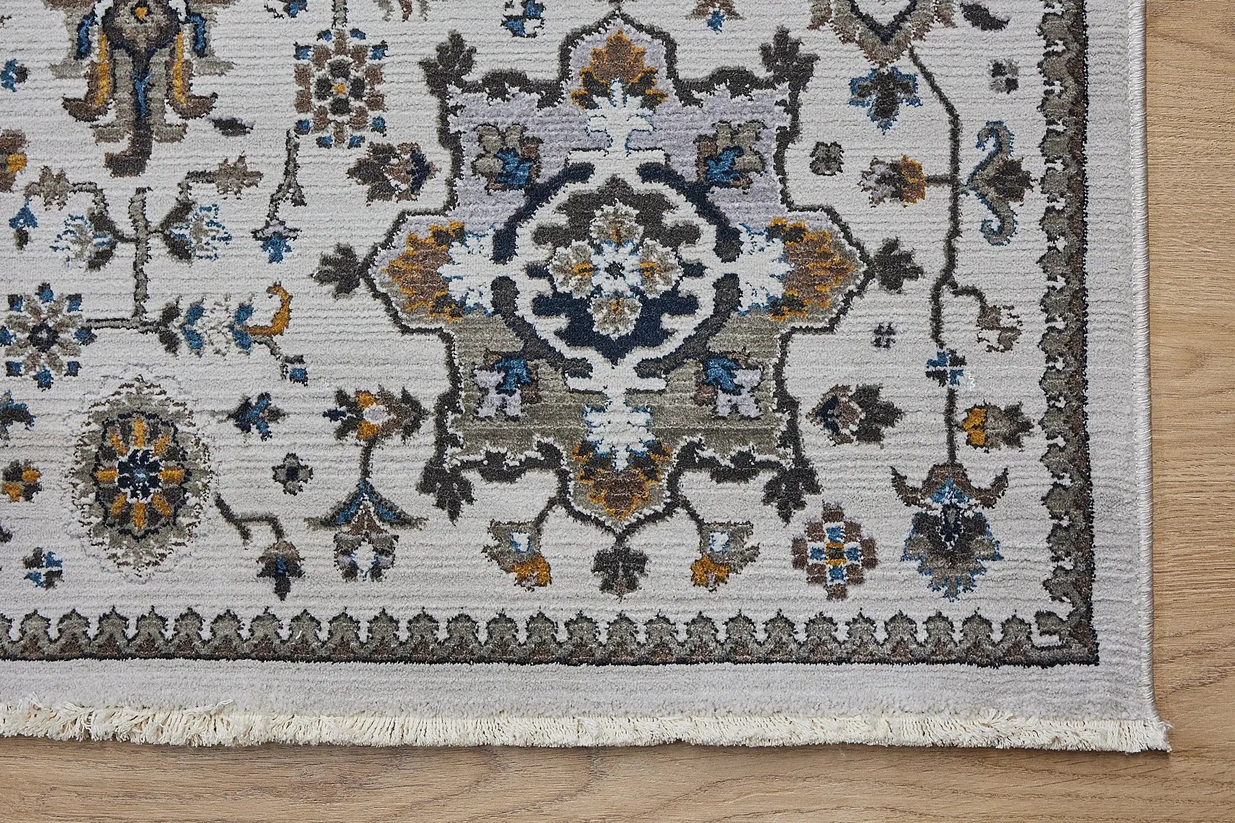 Persia Beige is a machine made traditional designed rug crafted from luxurious polyester for soft feel.  It has a 7-9mm Pile height. Colours beige with colourful accents. Sizes 160 X 230, 200 X 290, 240 X 340 and 300 X 400. Corner.