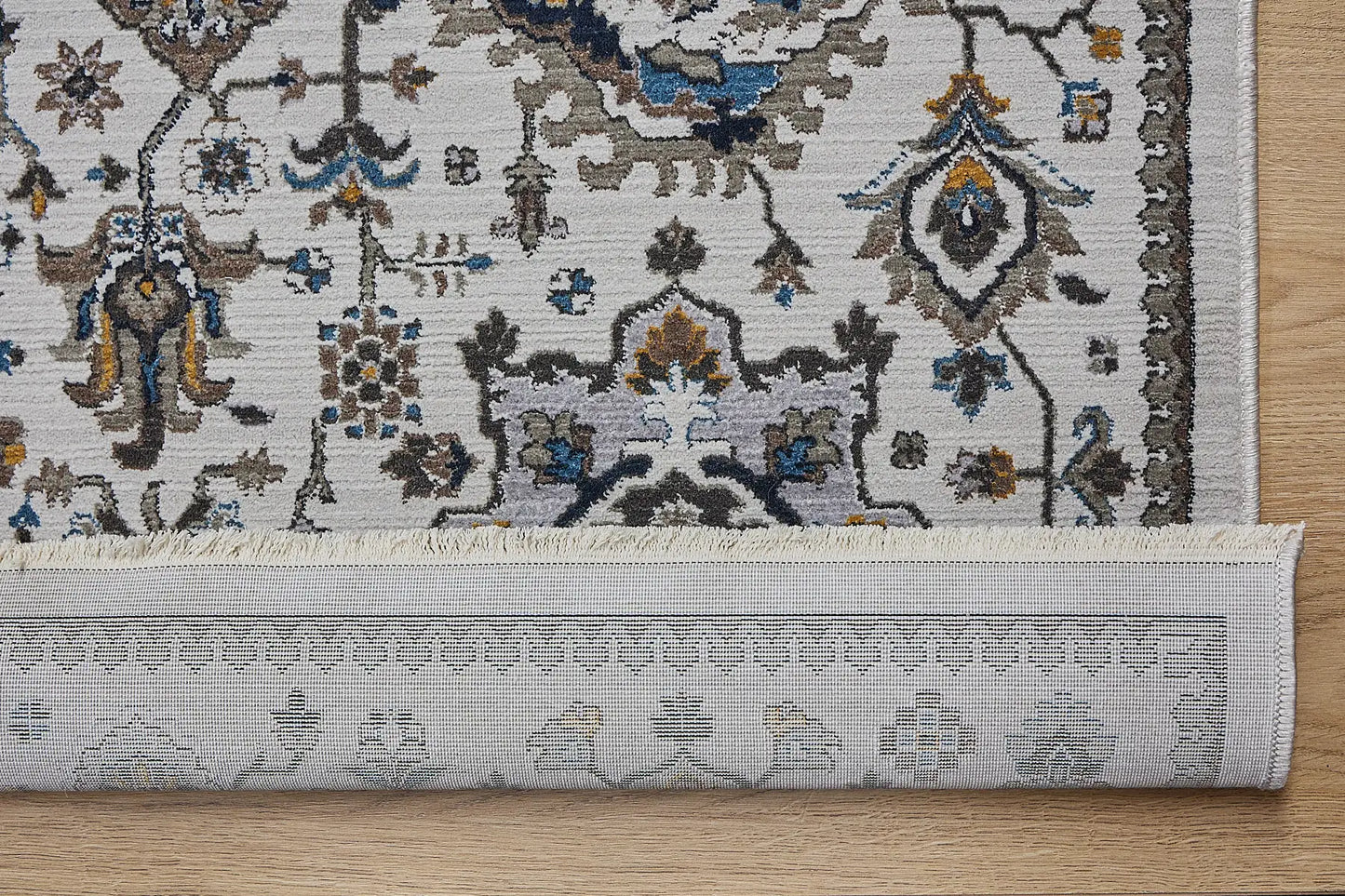 Persia Beige is a machine made traditional designed rug crafted from luxurious polyester for soft feel.  It has a 7-9mm Pile height. Colours beige with colourful accents. Sizes 160 X 230, 200 X 290, 240 X 340 and 300 X 400. Fold.