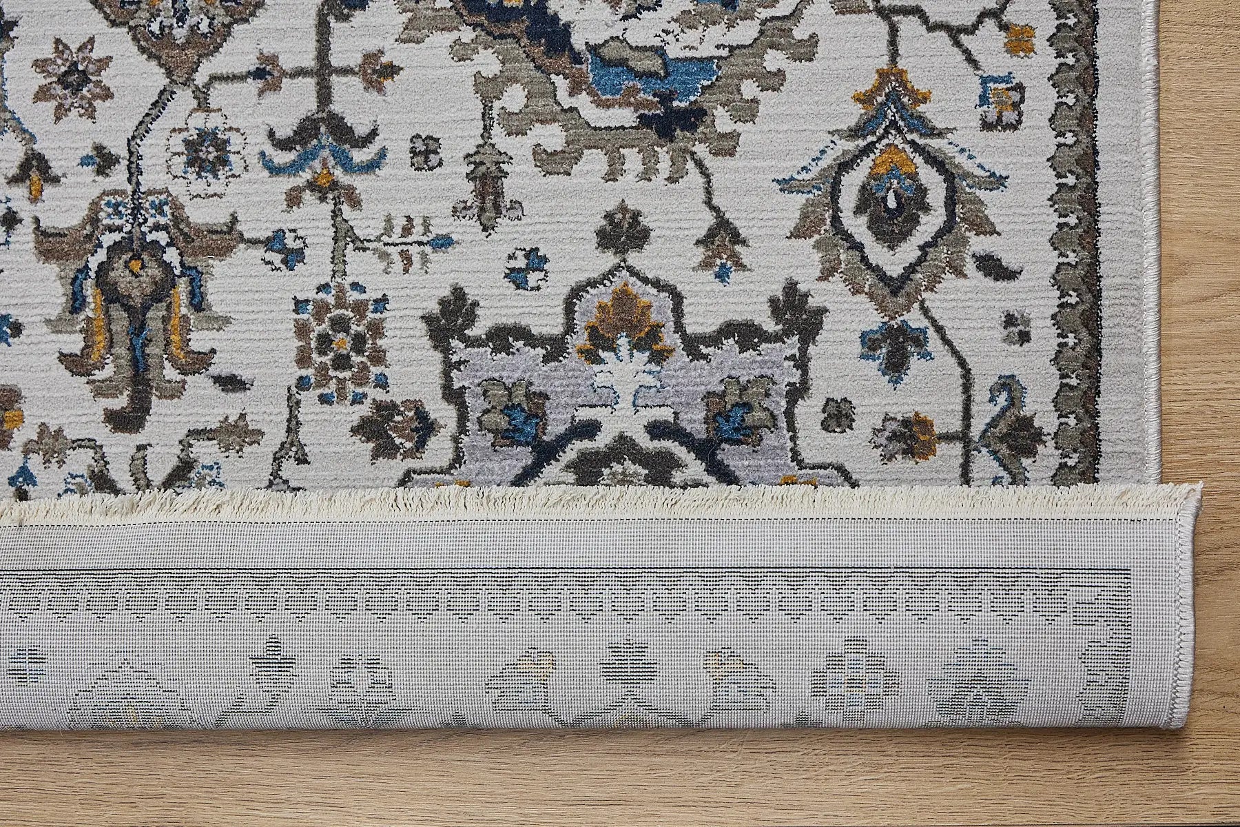 Persia Beige is a machine made traditional designed rug crafted from luxurious polyester for soft feel.  It has a 7-9mm Pile height. Colours beige with colourful accents. Sizes 160 X 230, 200 X 290, 240 X 340 and 300 X 400. Fold.