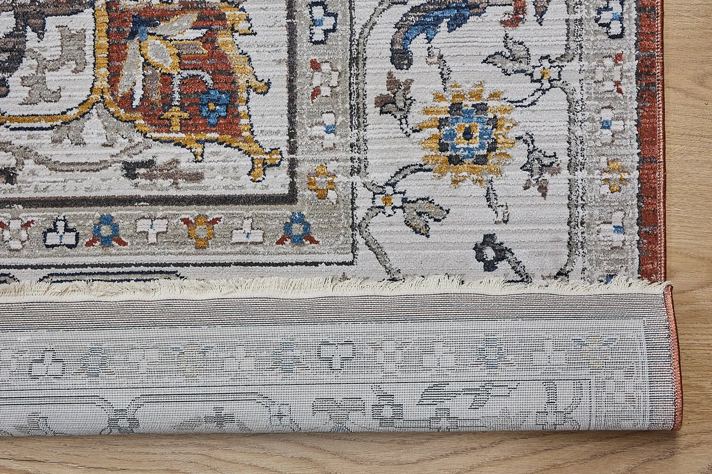 Persia Rust is a machine made traditional designed rug crafted from luxurious polyester for soft feel.  It has a 7-9mm Pile height. Colours beige with rust red and blue accents. Sizes 160 X 230, 200 X 290, 240 X 340 and 300 X 400. Fold.
