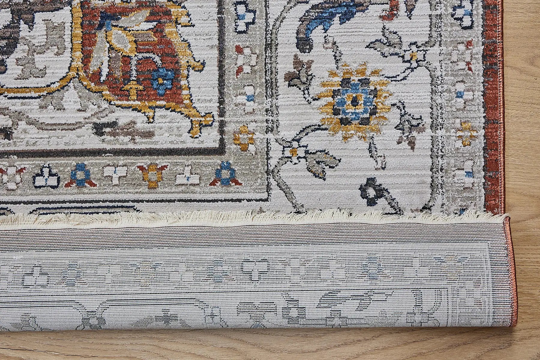 Persia Rust is a machine made traditional designed rug crafted from luxurious polyester for soft feel.  It has a 7-9mm Pile height. Colours beige with rust red and blue accents. Sizes 160 X 230, 200 X 290, 240 X 340 and 300 X 400. Fold.