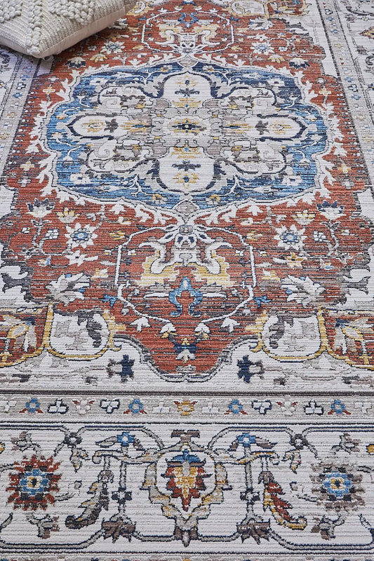 Persia Rust is a machine made traditional designed rug crafted from luxurious polyester for soft feel.  It has a 7-9mm Pile height. Colours beige with rust red and blue accents. Sizes 160 X 230, 200 X 290, 240 X 340 and 300 X 400. Life.
