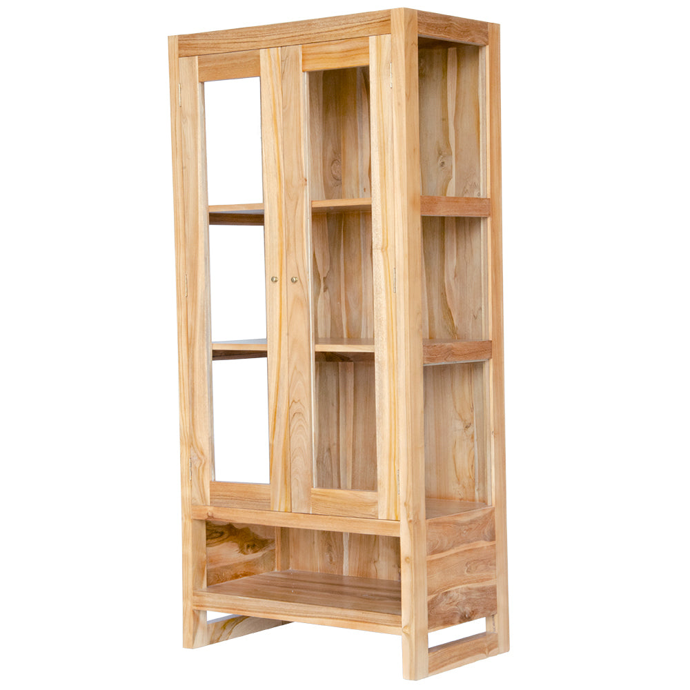 The Pisces Cabinet. Crafted from A grade teak featuring 2 glass doors and 1 lower shelf. Colour Natural. Measures 1700H x 450D x 800W. Angle.