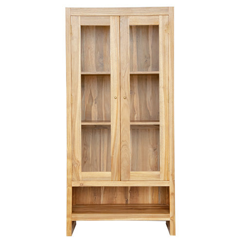 The Pisces Cabinet. Crafted from A grade teak featuring 2 glass doors and 1 lower shelf. Colour Natural. Measures 1700H x 450D x 800W. Front Plain.