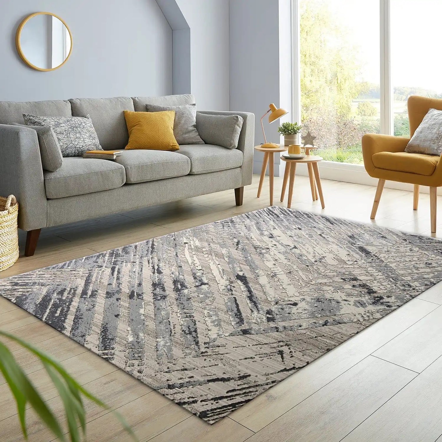 A polyester modern machine made rug styled in a modern Perth home living room.