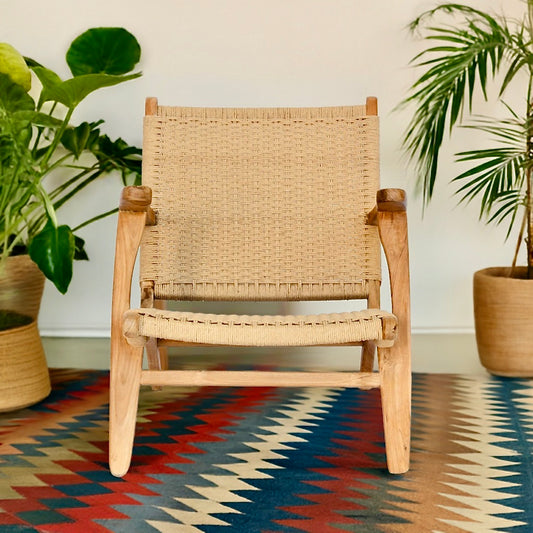 The Poppy Occasional Chair. Made with sustainable teak and synthetic rope, this occasional chair exudes style while providing comfort and durability. Measures 630 Wide X 700 Depth X 700 Height - 300 Seat Height. Styled.