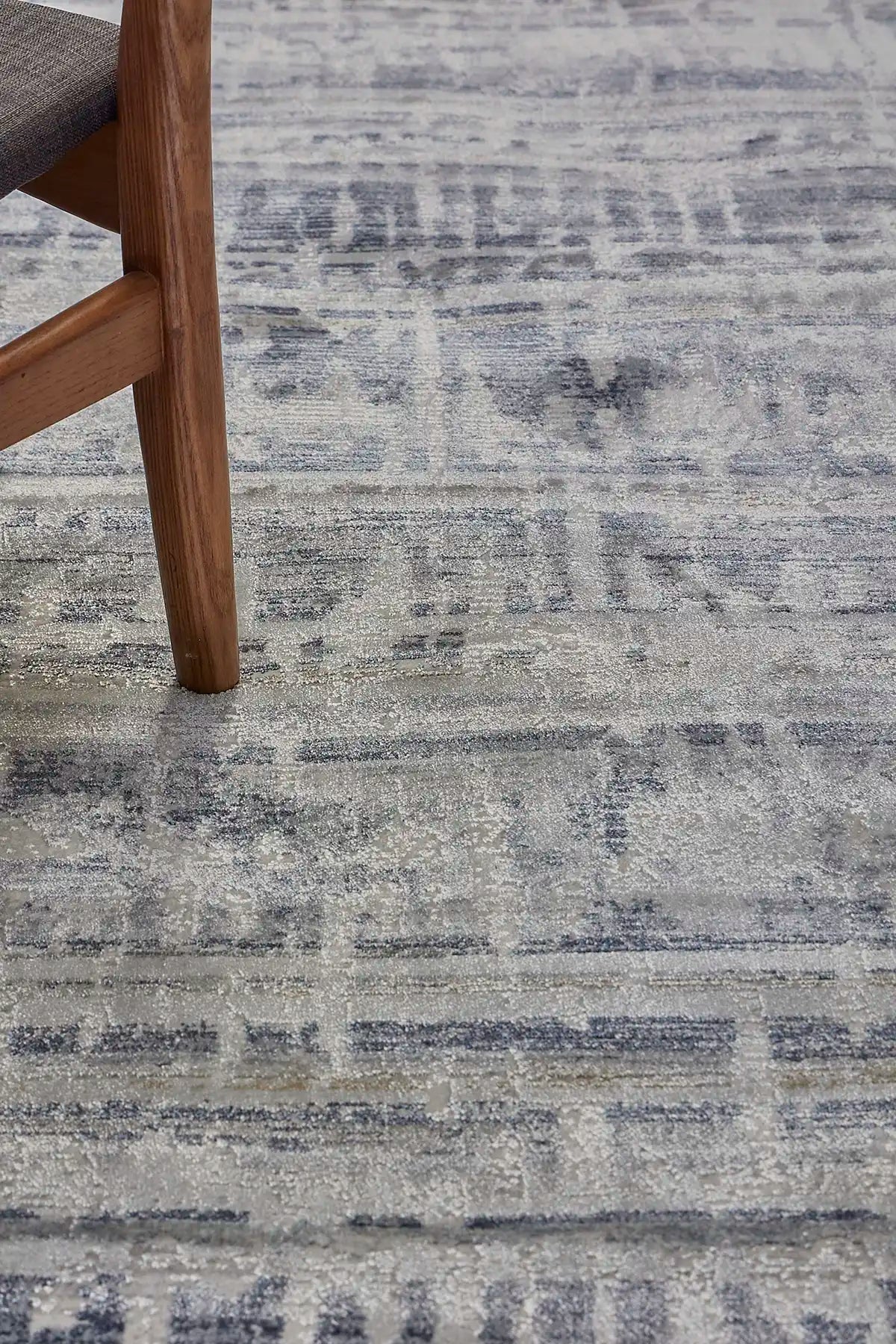 Raj Aqua is a machine made rug. Its design boasts a modern/contemporary feel. Crafted from Viscose and Polyester, with a low-profile 7-9mm pile height. Colours Blue,Grey and Light Grey tones. Sizes 160 X 230, 200 X 290, 240 X 340 and 300 X 400. Life.