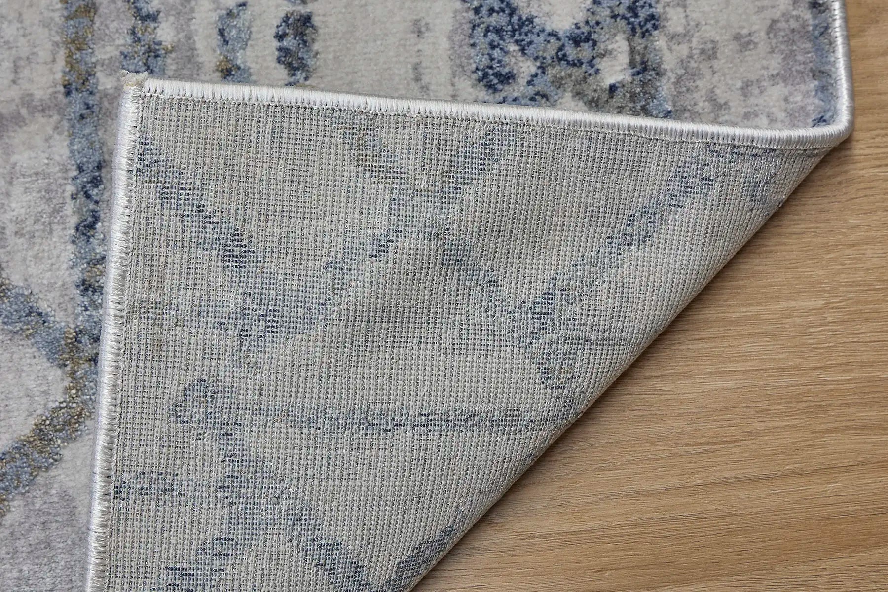 Raj Blue is a machine made rug. Its design boasts a geometric modern/contemporary feel. Crafted from Viscose and Polyester, with a low-profile 7-9mm pile height. Colours Blue,Grey and Light Grey tones. Sizes 160 X 230, 200 X 290, 240 X 340 and 300 X 400. Fold.