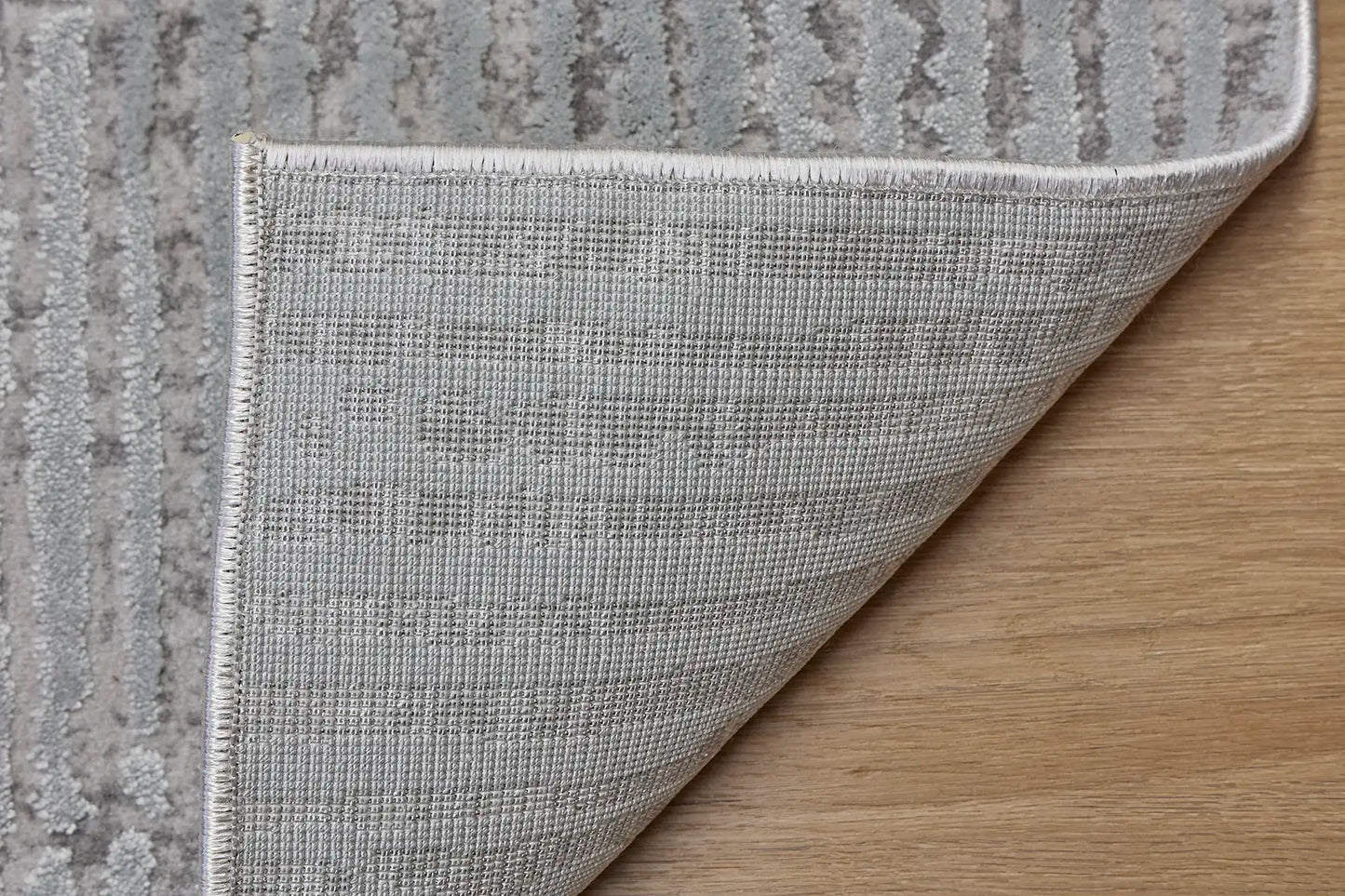 Raj Cloud is a machine made rug. Its design boasts a modern/contemporary feel. Crafted from Viscose and Polyester, with a low-profile 7-9mm pile height. Colours Light Grey,White and Grey tones. Sizes 160 X 230, 200 X 290, 240 X 340 and 300 X 400. Fold.