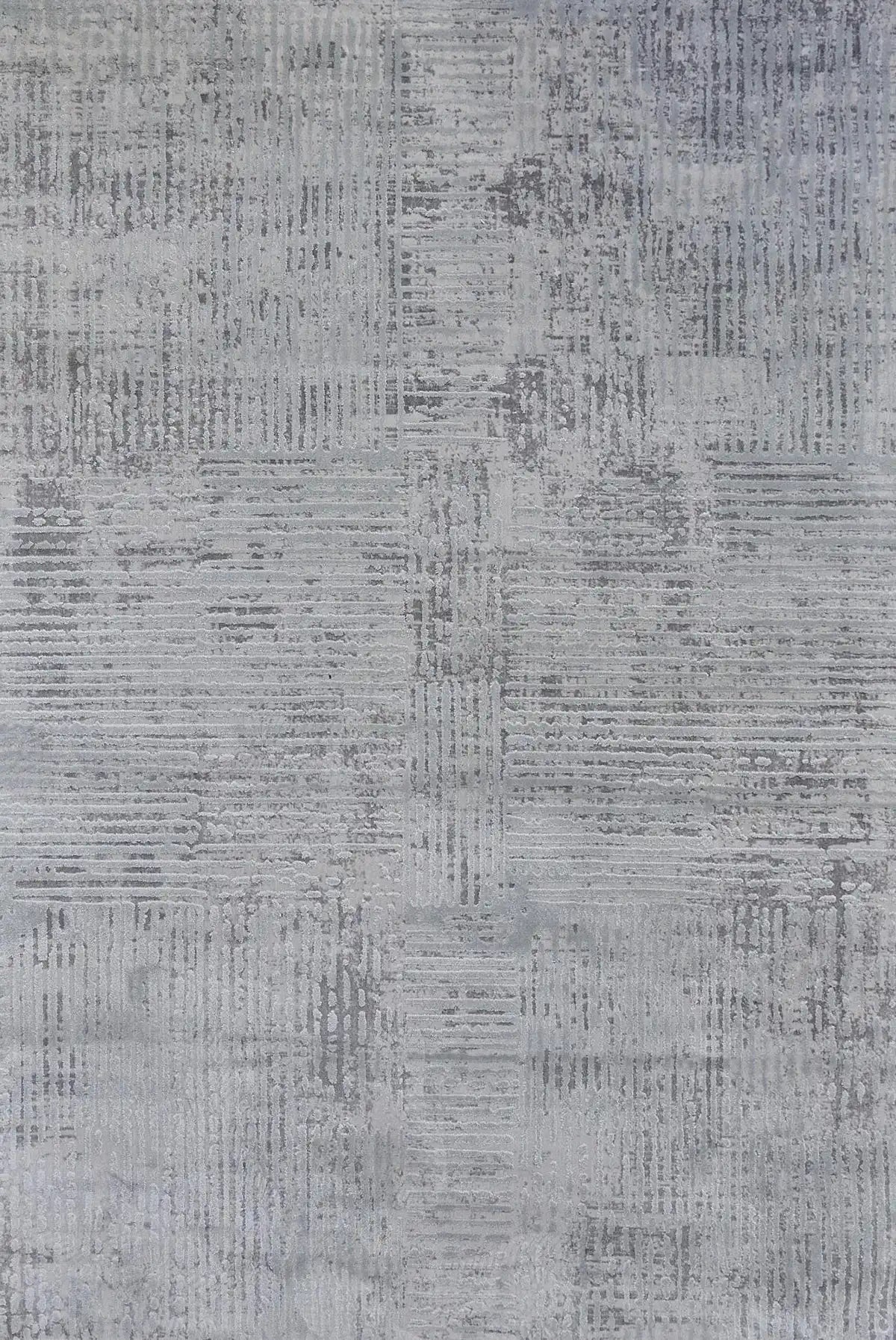 Raj Cloud is a machine made rug. Its design boasts a modern/contemporary feel. Crafted from Viscose and Polyester, with a low-profile 7-9mm pile height. Colours Light Grey,White and Grey tones. Sizes 160 X 230, 200 X 290, 240 X 340 and 300 X 400. Full.