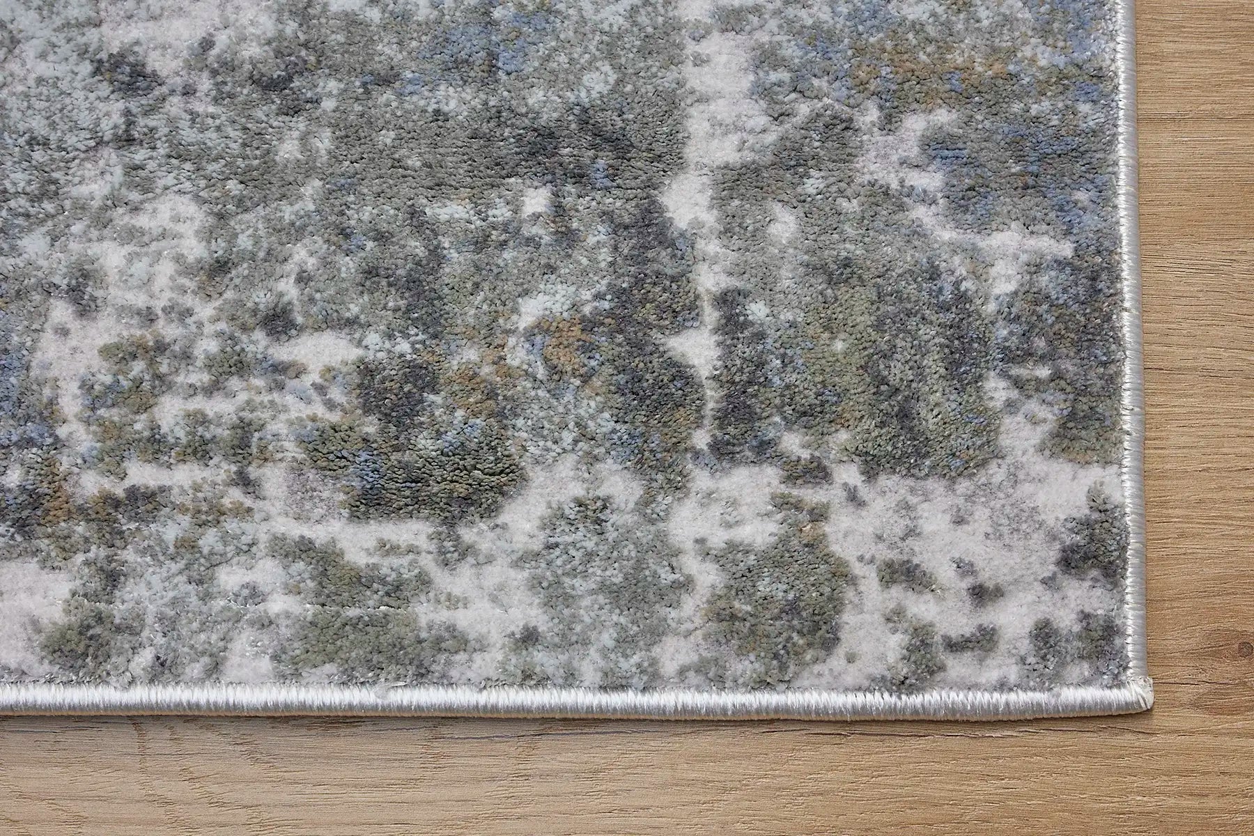 Raj Grey is a machine made rug. Its design boasts a modern/contemporary feel. Crafted from Viscose and Polyester, with a low-profile 7-9mm pile height. Colours Light Grey, and Grey tones. Sizes 160 X 230, 200 X 290, 240 X 340 and 300 X 400. Corner.