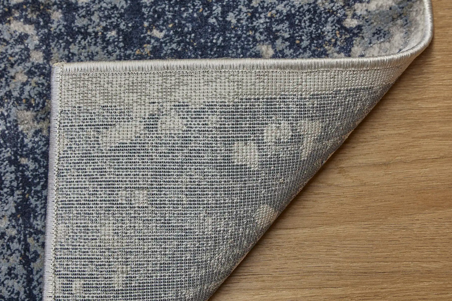 Raj Indigo is a machine made rug. Its design boasts a modern/contemporary feel. Crafted from Viscose and Polyester, with a low-profile 7-9mm pile height. Colours Light Grey with blue and white accents. Sizes 160 X 230, 200 X 290, 240 X 340 and 300 X 400. Fold.