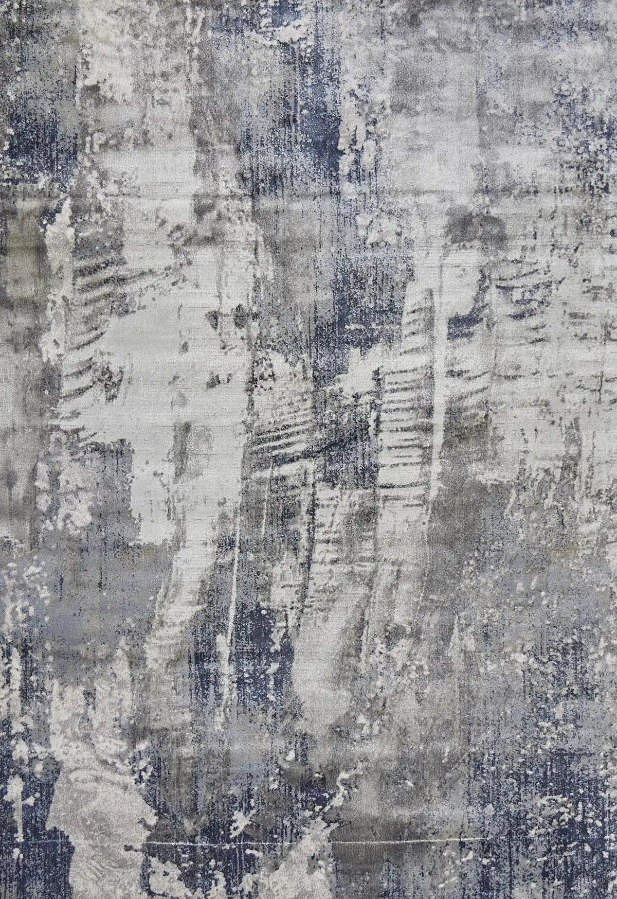 Raj Indigo is a machine made rug. Its design boasts a modern/contemporary feel. Crafted from Viscose and Polyester, with a low-profile 7-9mm pile height. Colours Light Grey with blue and white accents. Sizes 160 X 230, 200 X 290, 240 X 340 and 300 X 400. Full.