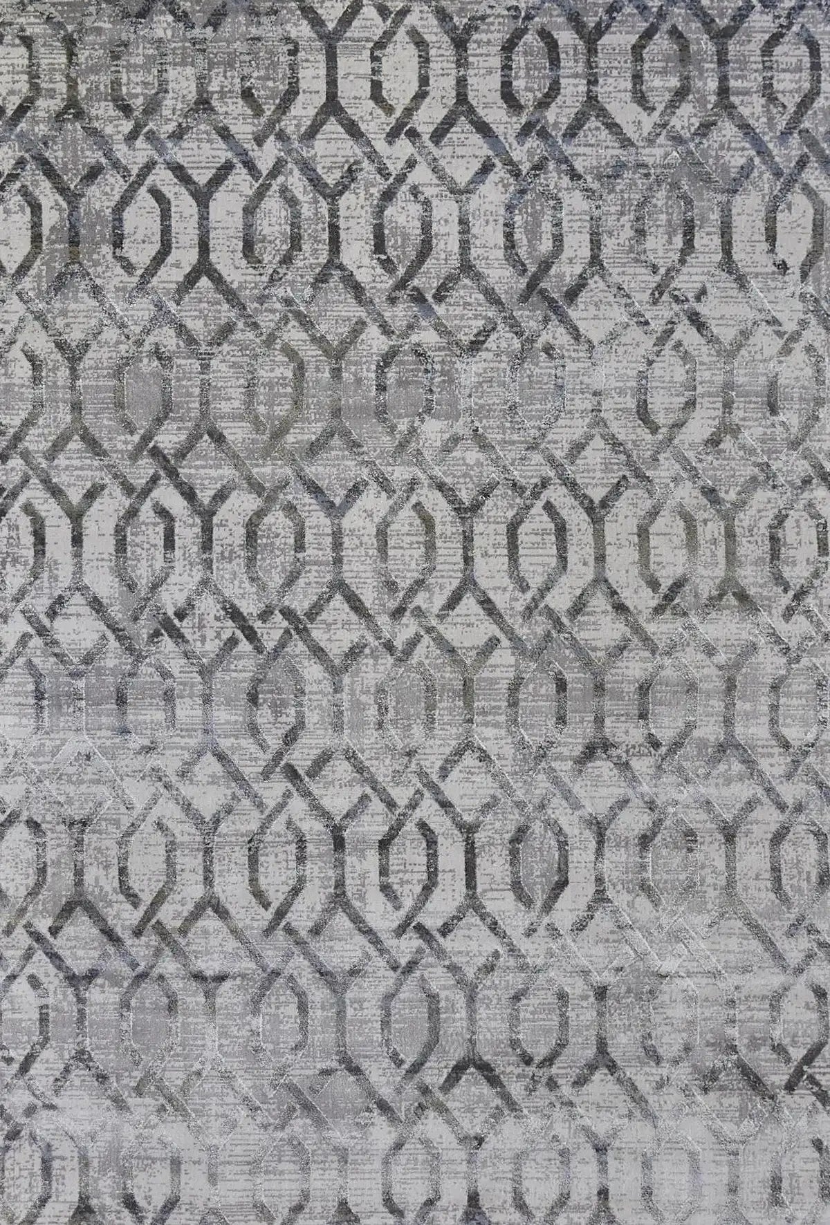 Raj Silver is a machine made rug. Its design boasts a geometric modern/contemporary feel. Crafted from Viscose and Polyester, with a low-profile 7-9mm pile height. Colours Light Grey with grey and beige/white accents. Sizes 160 X 230, 200 X 290, 240 X 340 and 300 X 400. Full.