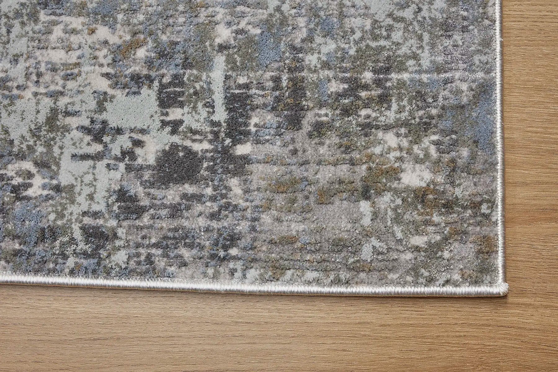 Raj Taupe is a machine made rug. Its design boasts a modern/contemporary feel. Crafted from Viscose and Polyester, with a low-profile 7-9mm pile height. Colours Light Grey with grey and beige accents. Sizes 160 X 230, 200 X 290, 240 X 340 and 300 X 400. Corner.