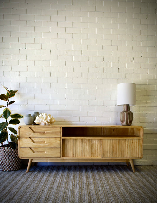 The Redford 3 Drawer 2 Sliding door entertainment unit is a contemporary designed, 3 drawer, on wooden runners, and 2 sliding textured doors entertainment unit.  Crafted from sustainable fruitwood. Colour natural. Measures 1700 length X 400 depth X 650 height. Front Styled.