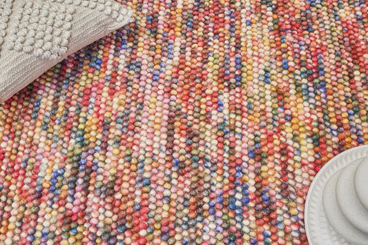 Rocks Multi is a luxurious hand-woven wool carpet. Boasting a plush loop pile with 8-18mm pile height. Colour Multi coloured. Sizes 160 X 230, 200 X 290, 240 X 340 and 290 X 390. Life.