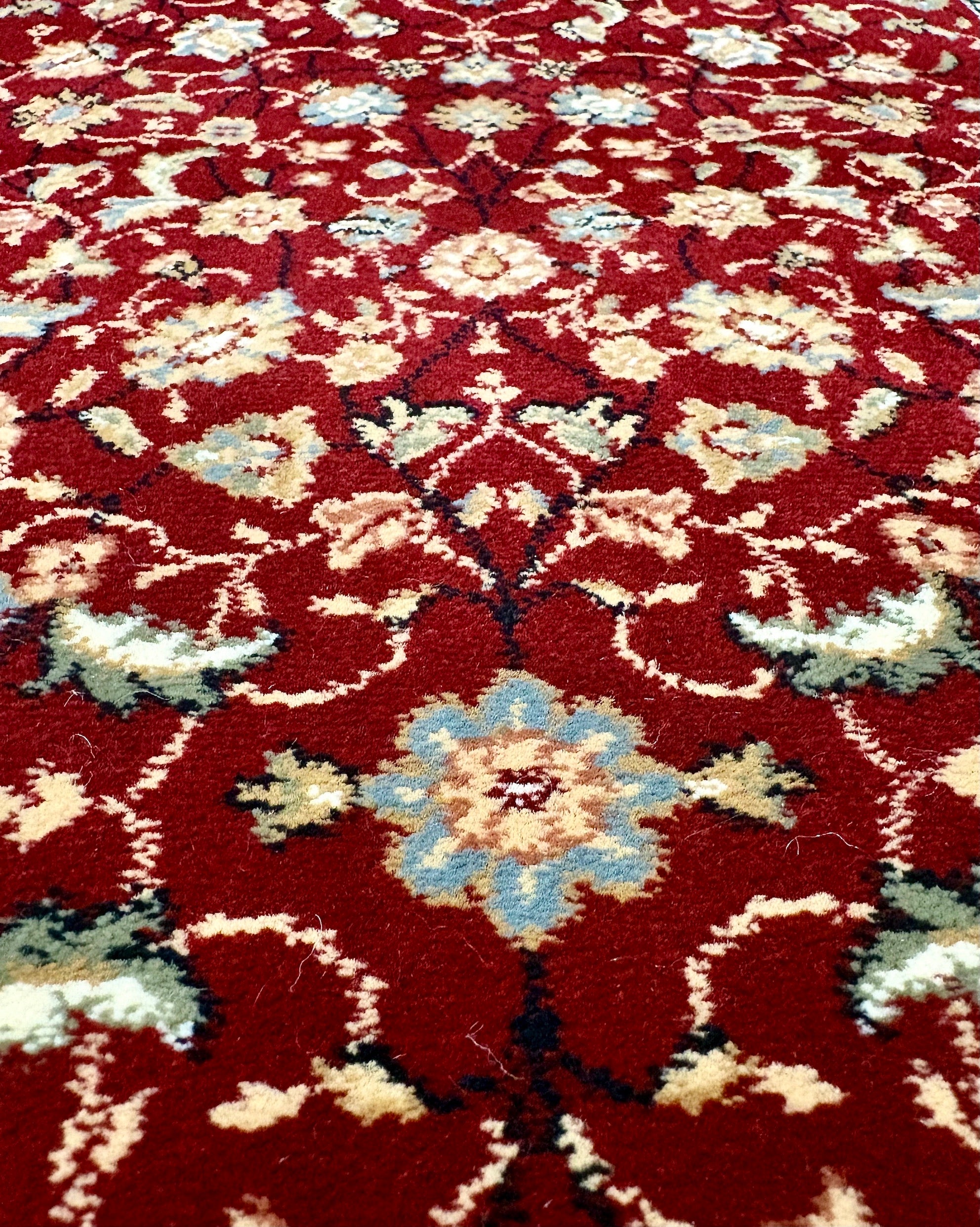 Close view of a machine made polypropylene rug.