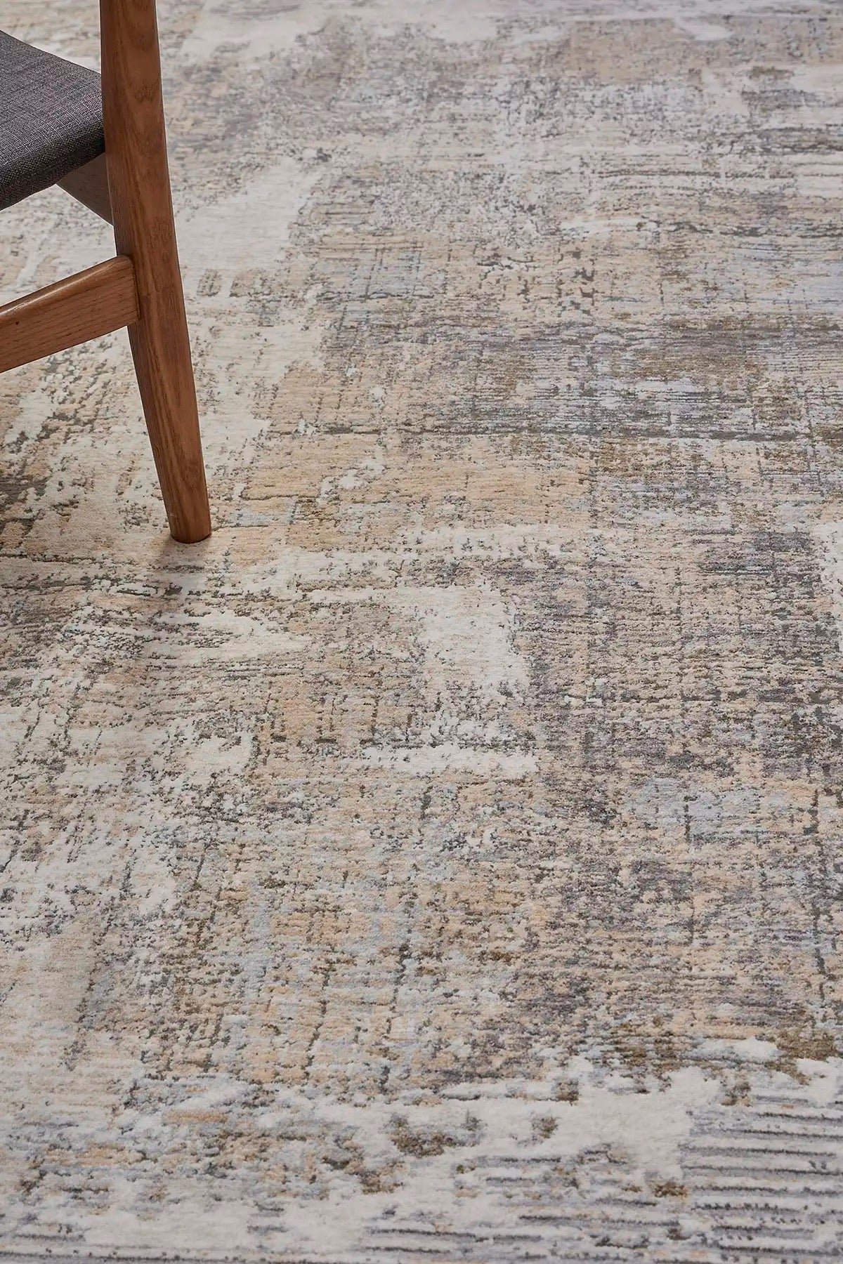 Close view of a machine made polyester rug.