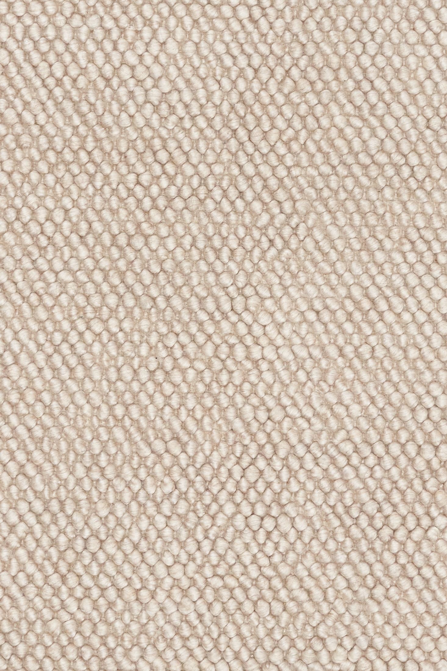 Rusta Beige hand-woven wool rug featuring a looped pile textured design in soft neutral beige tones, ideal for modern and contemporary interiors. Sizes 155 X 225, 200 X 290, 240 X 320 and 300 X 400. Close.