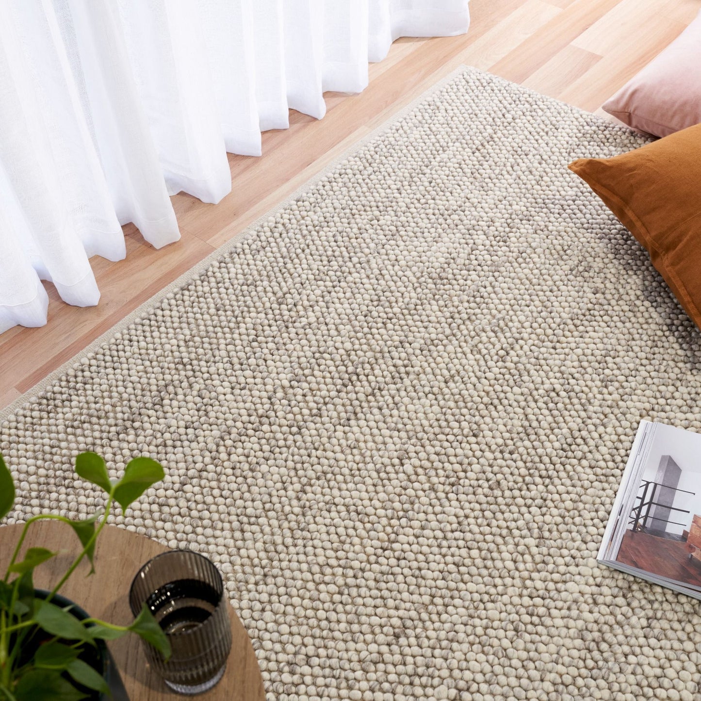 Rusta Silver hand-woven wool rug featuring a looped pile textured design in soft silver tones, ideal for modern and contemporary interiors. Sizes 155 X 225, 200 X 290, 240 X 320 and 300 X 400. Life.