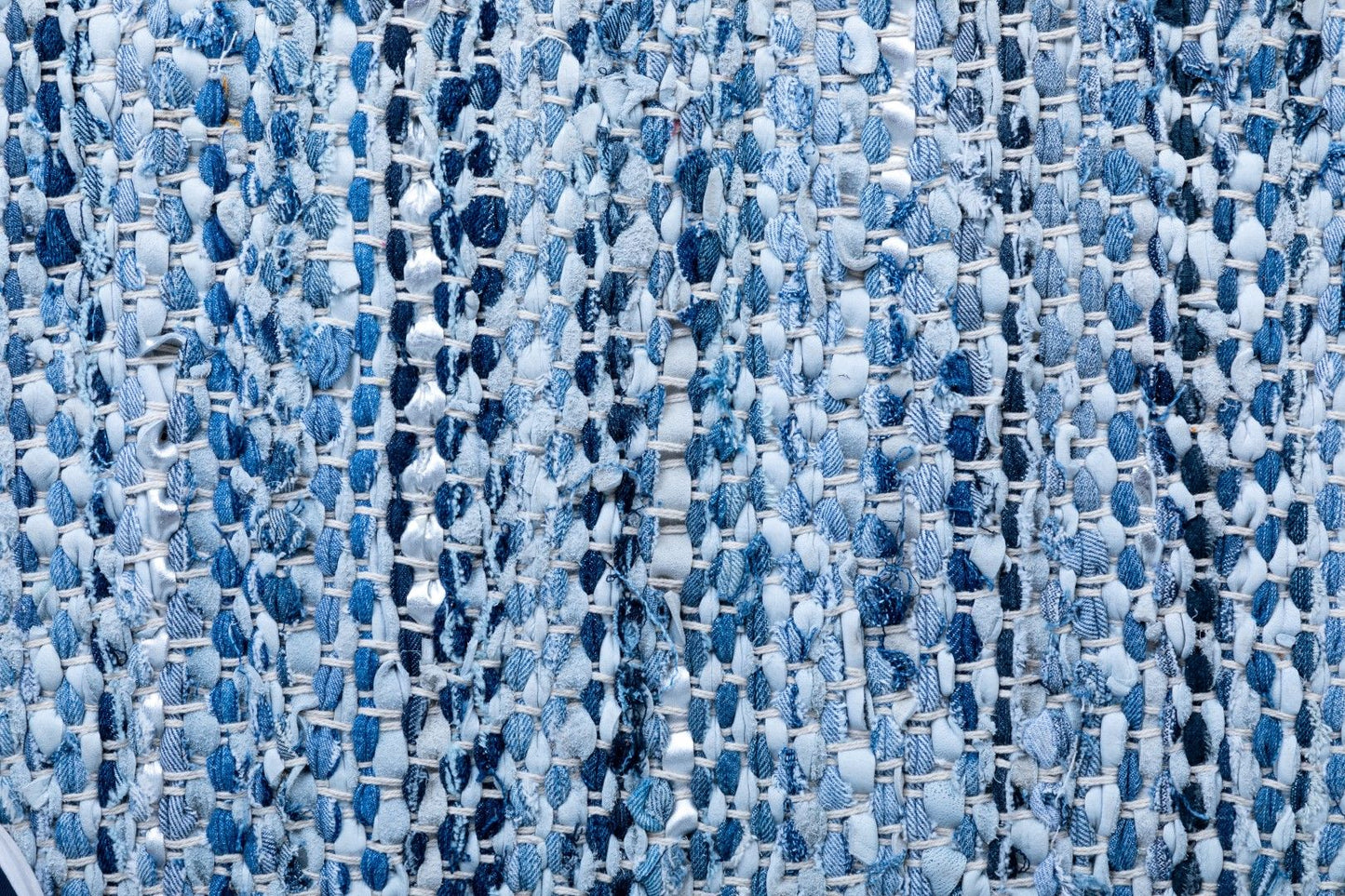Rustic Charm Blue is a hand woven natural jute and leather carpet.  Colour Light Blue and Blue. Sizes 155 X 225, 200 X 290, 240 X 320 and 300 X 400. Close.
