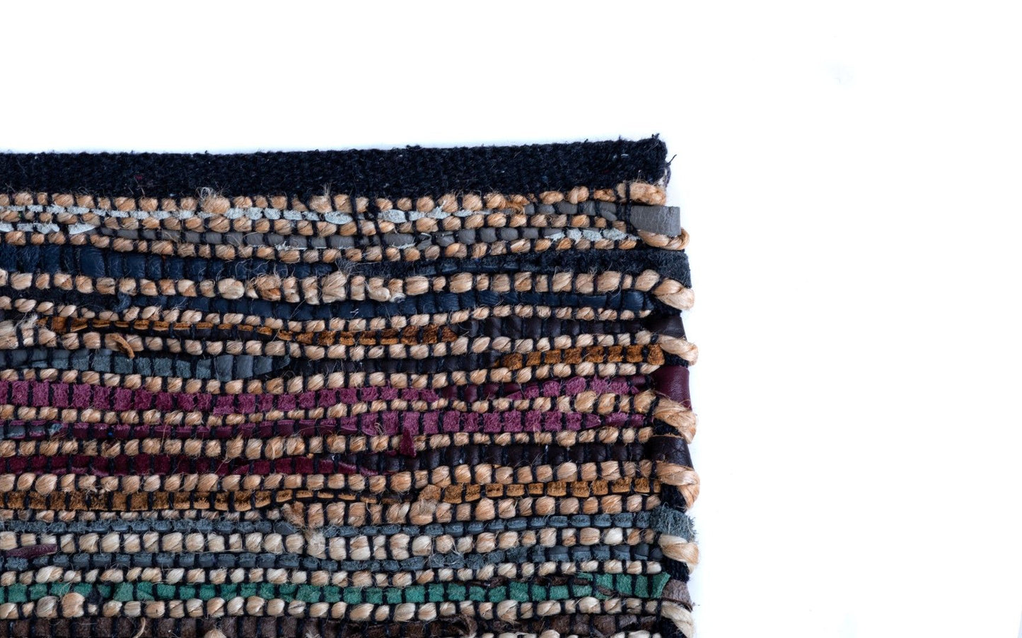 Rustic Charm Multi is a hand woven natural jute and leather carpet.  Colour Black with a multi colour accents. Sizes 155 X 225, 200 X 290, 240 X 320 and 300 X 400. Corner.