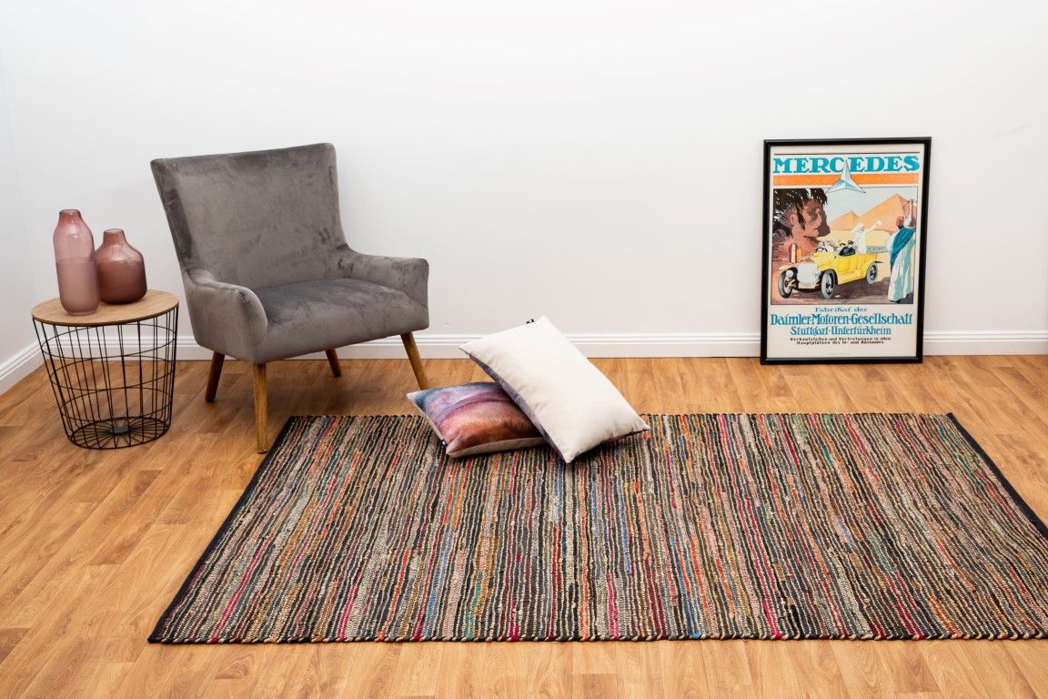 Rustic Charm Multi is a hand woven natural jute and leather carpet.  Colour Black with a multi colour accents. Sizes 155 X 225, 200 X 290, 240 X 320 and 300 X 400. Life.