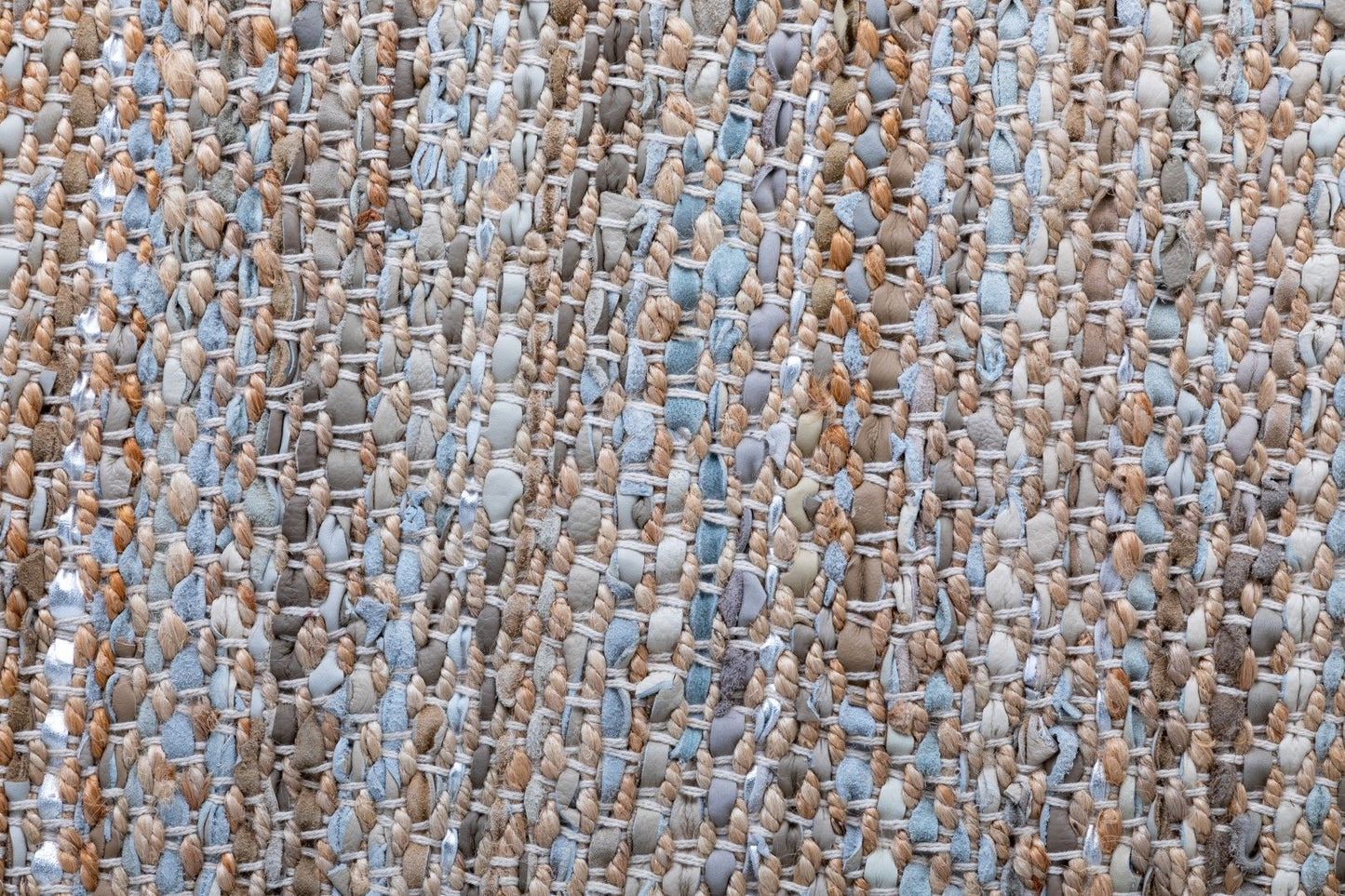 Rustic Charm Natural White is a hand woven natural jute and leather carpet.  Colour Natural Jute with a Blue, beige and grey leather accents. Sizes 200 X 290, 240 X 320 and 300 X 400. Close.