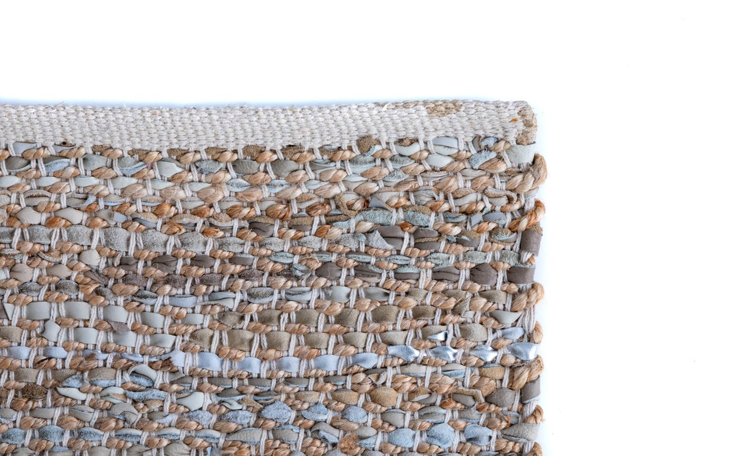 Rustic Charm Natural White is a hand woven natural jute and leather carpet.  Colour Natural Jute with a Blue, beige and grey leather accents. Sizes 200 X 290, 240 X 320 and 300 X 400. Corner.