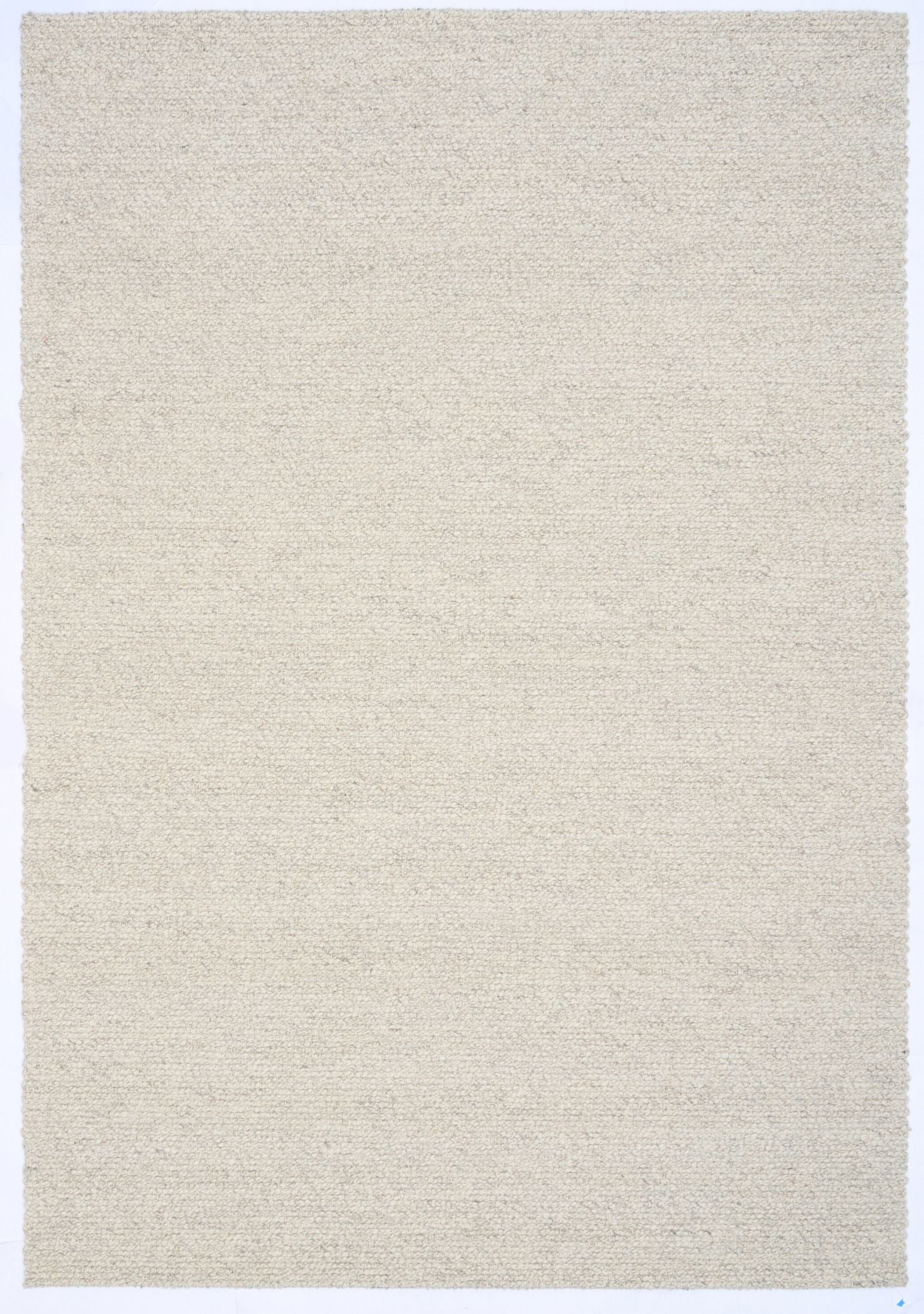 Sahara Grey Rug – hand woven 100% wool rug in soft neutral tones with a textured finish, available in three sizes, styled for modern and coastal homes. Top.
