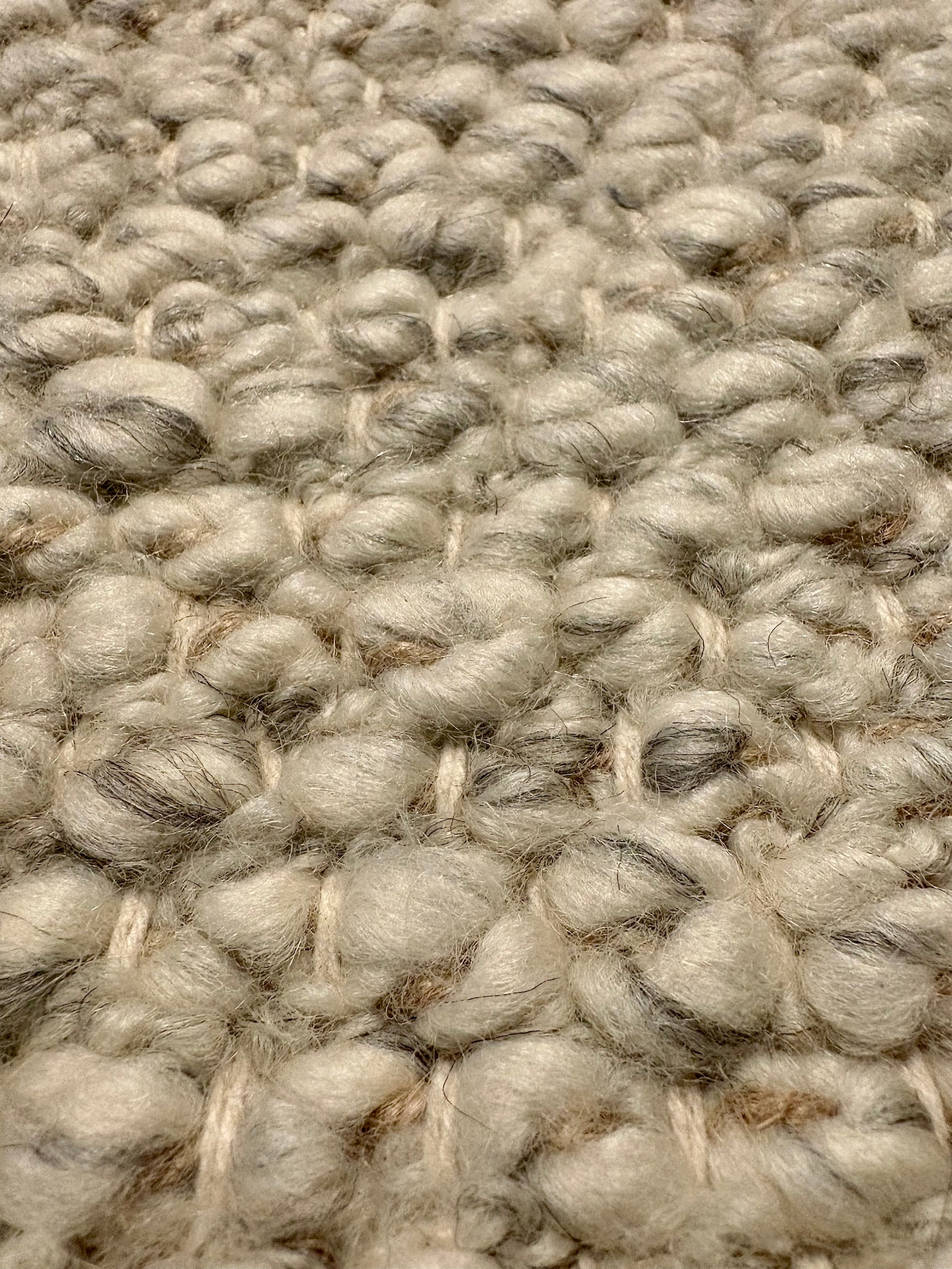 Sahara Grey Rug – hand woven 100% wool rug in soft neutral tones with a textured finish, available in three sizes, styled for modern and coastal homes. Super Close.