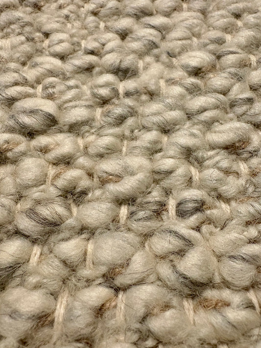 Sahara Grey Rug – hand woven 100% wool rug in soft neutral tones with a textured finish, available in three sizes, styled for modern and coastal homes. Super Close.