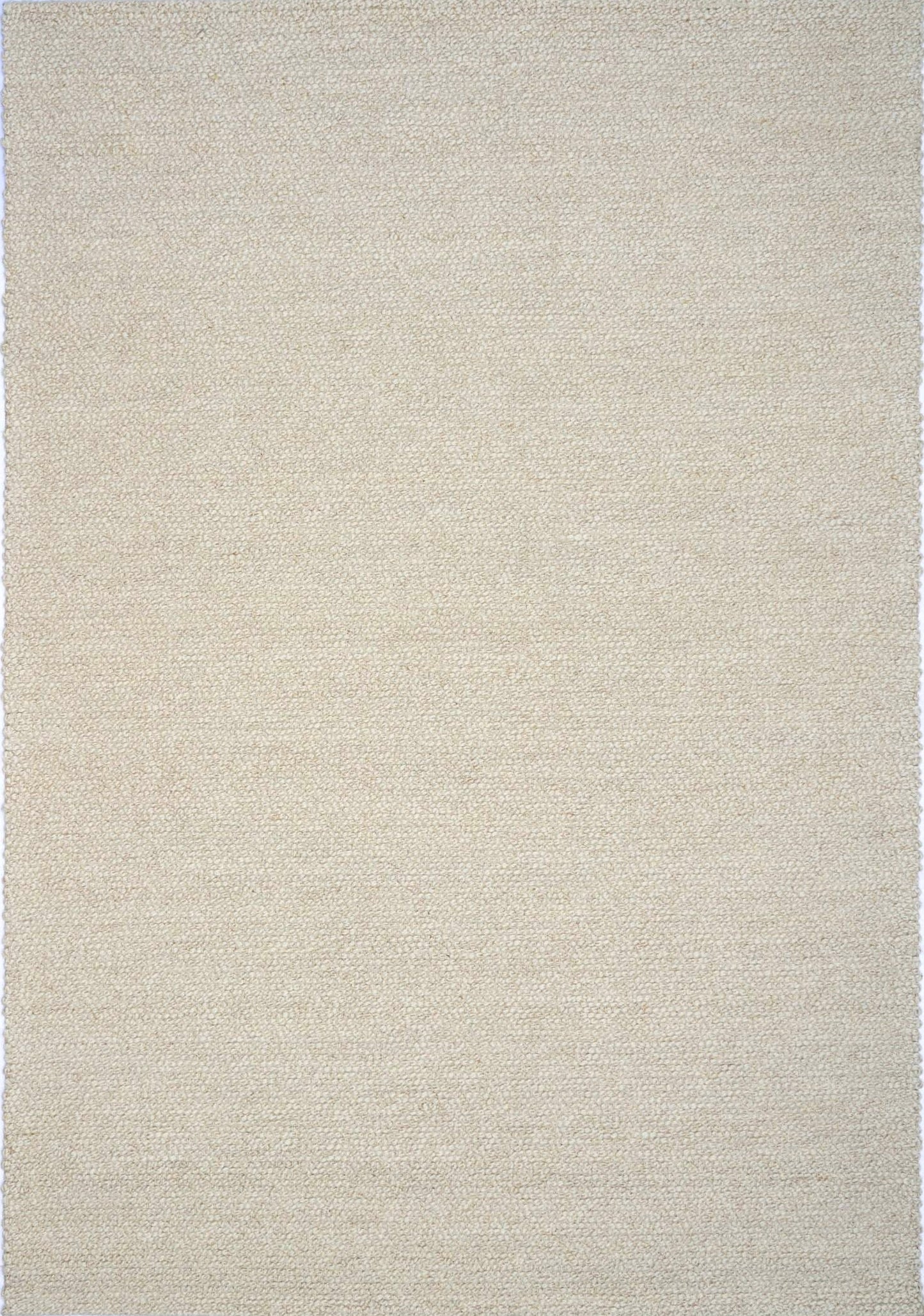 Sahara Ivory Rug – hand woven 100% wool rug in soft neutral tones with a textured finish, available in three sizes, styled for modern and coastal homes. Full Size.