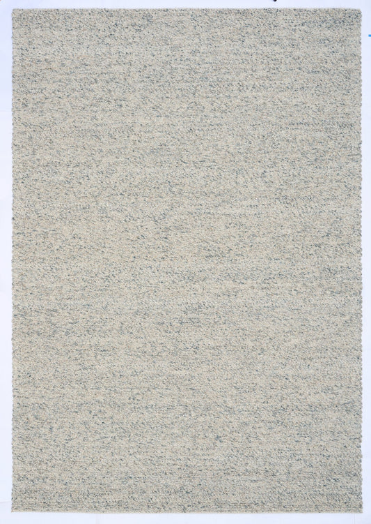 Sahara Teal Rug – hand woven 100% wool rug in soft neutral tones with a textured finish, available in three sizes, styled for modern and coastal homes. Top.