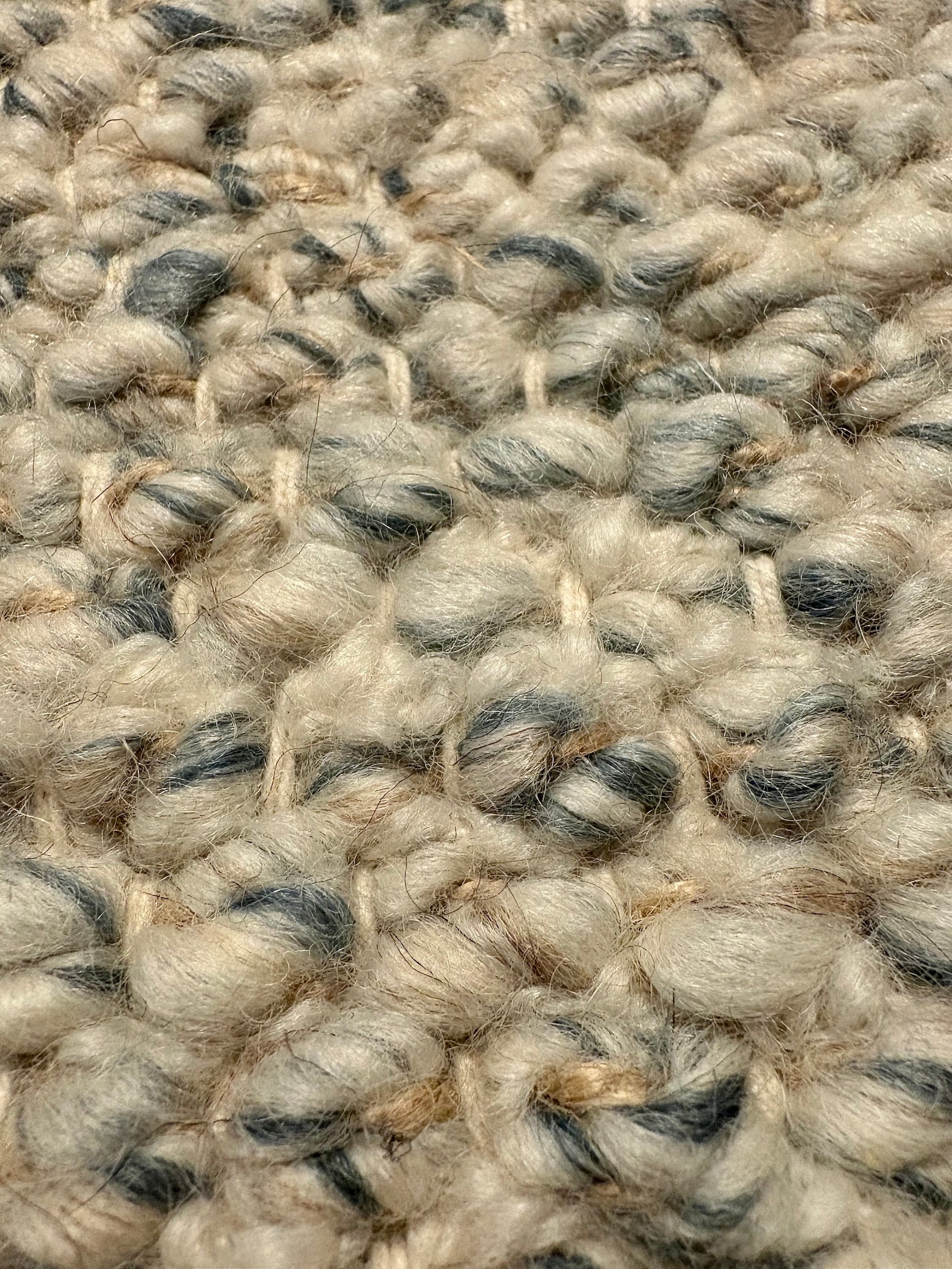 Sahara Teal Rug – hand woven 100% wool rug in soft neutral tones with a textured finish, available in three sizes, styled for modern and coastal homes. Super Close.